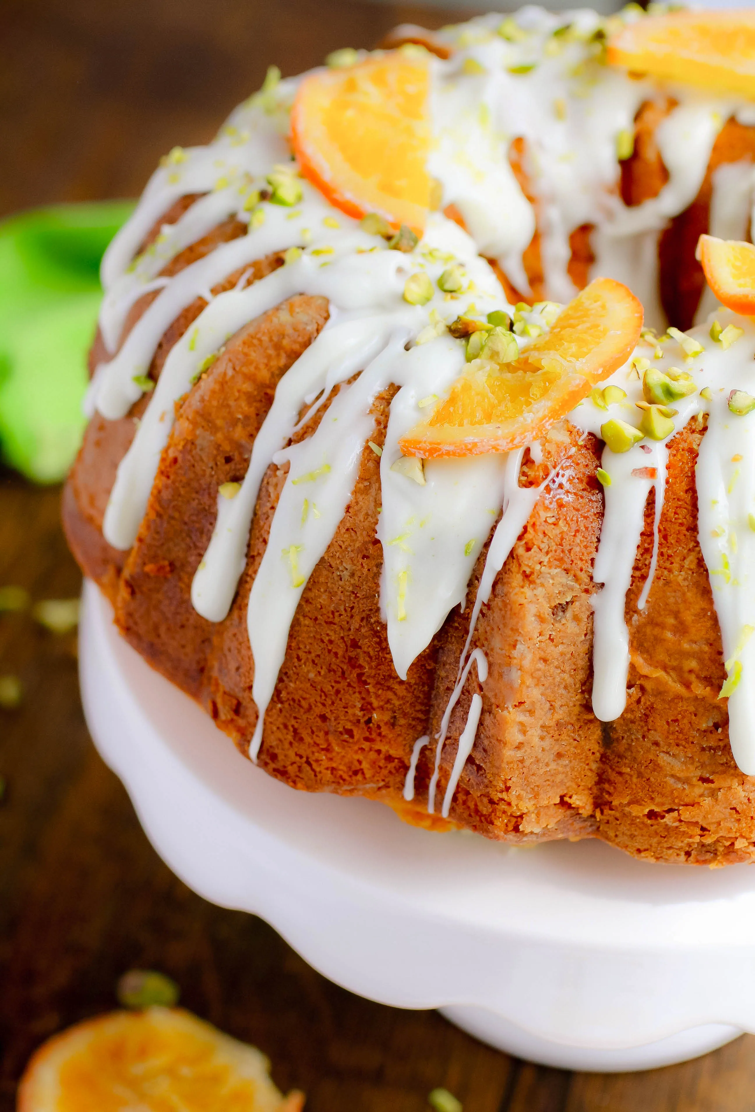Orange Marmalade-Pistachio Bundt Cake is a show-stopping dessert! You'll love how pretty and delicious this Orange Marmalade-Pistachio Bundt Cake is! 