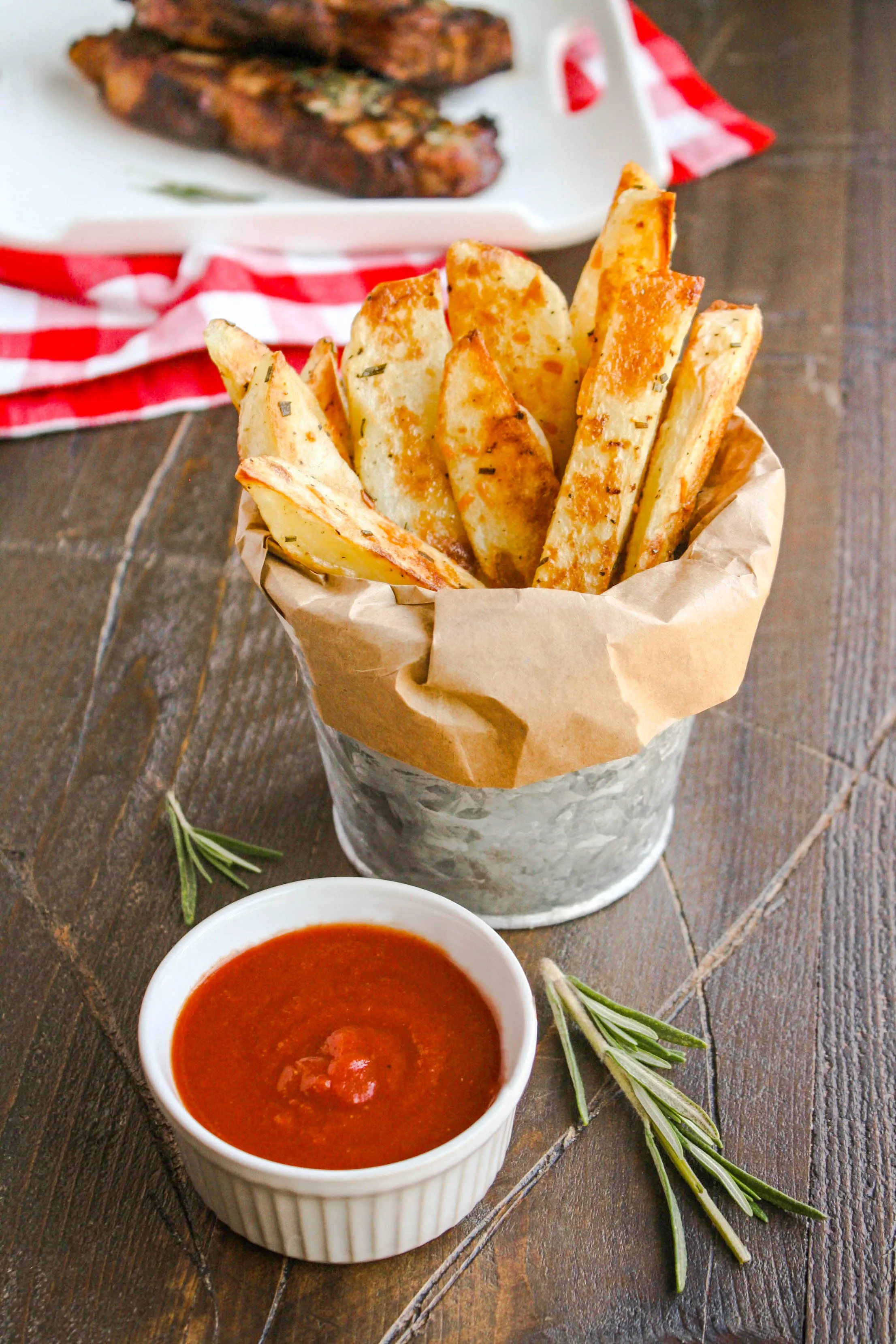 Oven Baked Rosemary Steak Fries Homemade Ketchup make a great side dish. You'll love their crispiness.