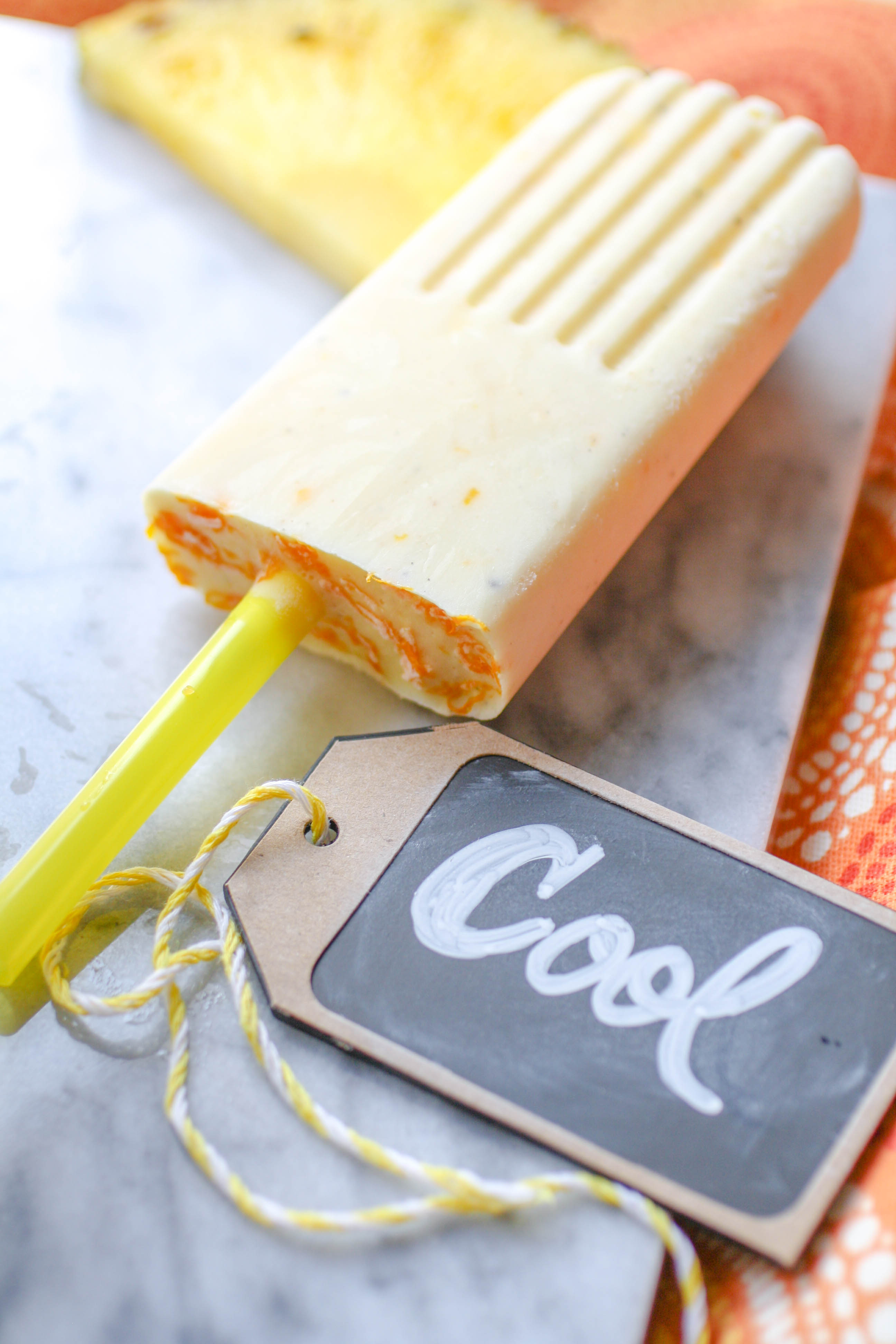 Pineapple-Orange & Cardamom Creamsicles are tasty frozen treats! Pineapple-Orange & Cardamom Creamsicles are delicious when it's hot out (and even when it's not)! Pineapple-Orange & Cardamom Creamsicles make a great summertime treat!
