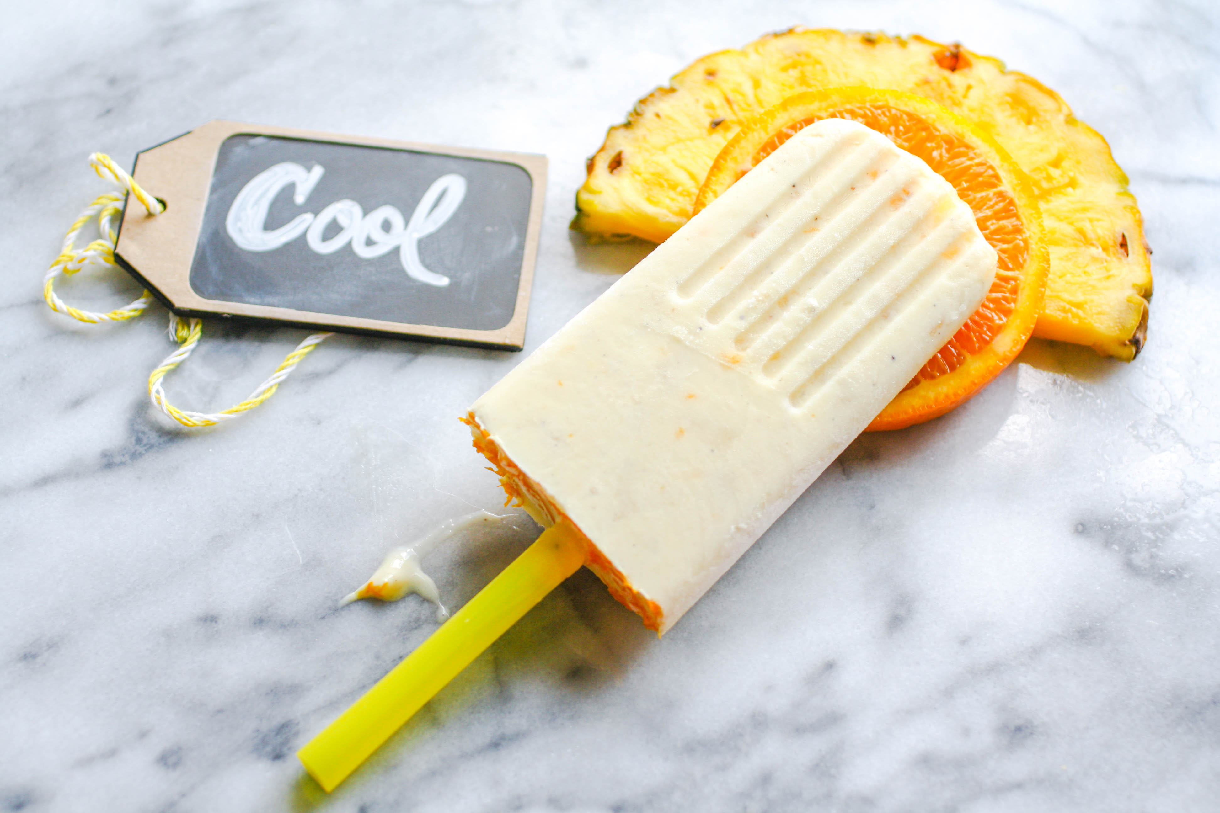 Pineapple-Orange & Cardamom Creamsicles are fun and easy to make for frosty fun! Pineapple-Orange & Cardamom Creamsicles are a delightful treat in the summer! Pineapple-Orange & Cardamom Creamsicles are frosty, fruity, and fun treats!