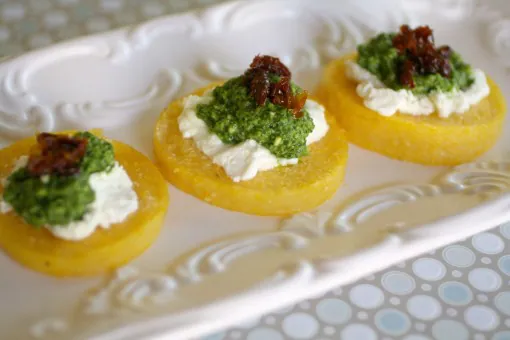 For a wonderful appetizer, try Polenta Cakes with Goat Cheese and Kale Pesto