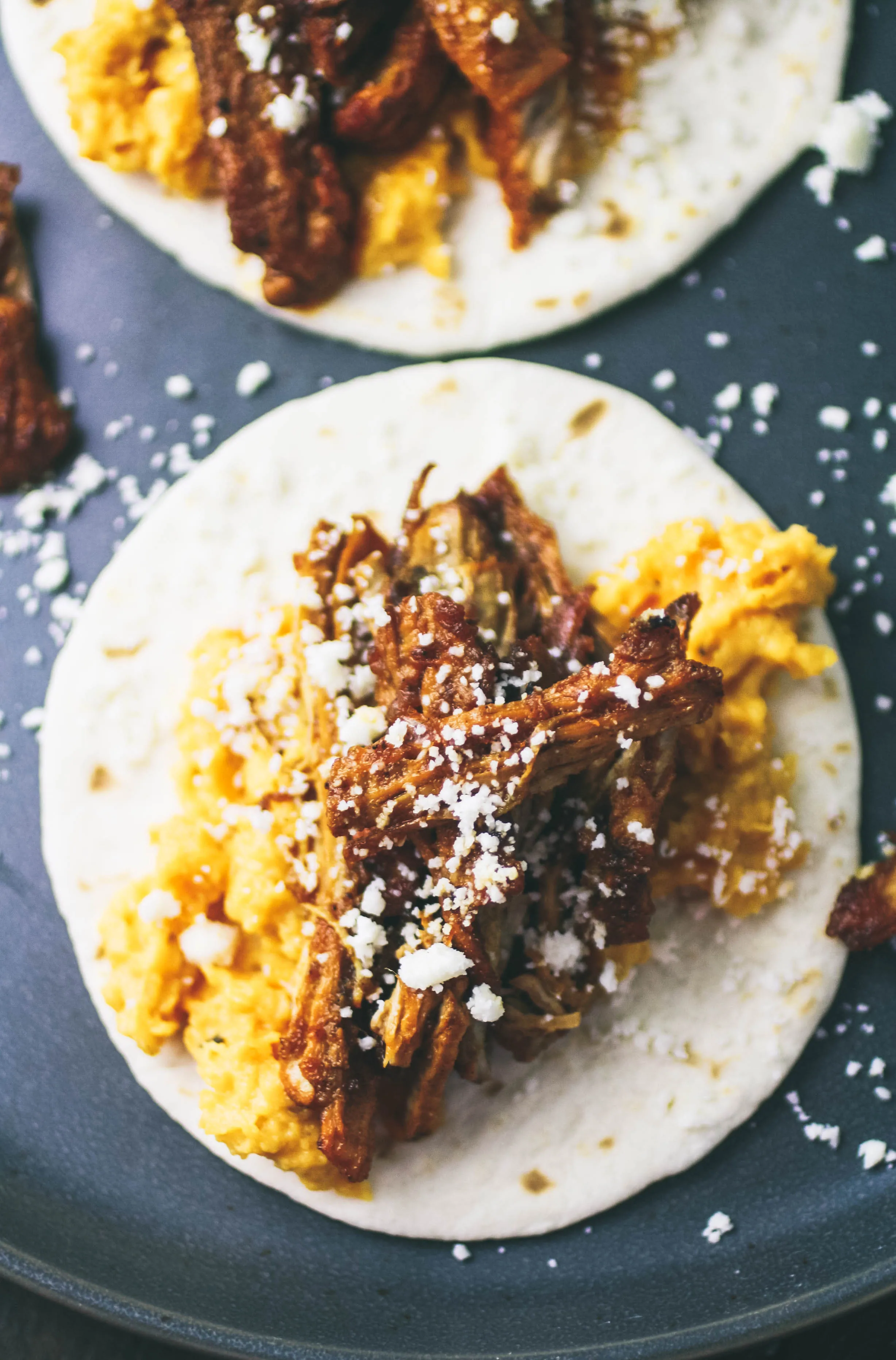 Pork Carnitas Tacos with Butternut Squash Puree are fabulous any night of the week for dinner. Make these Pork Carnitas Tacos with Butternut Squash Puree soon!