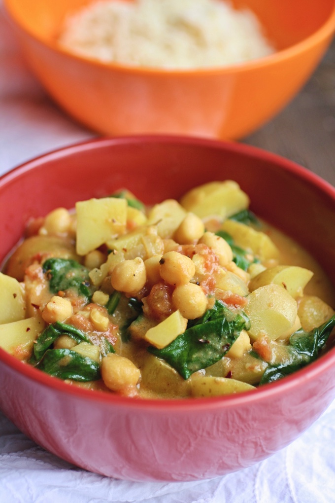 Potato, Chickpea, and Spinach Curry is filling and flavorful. You'll love this meatless and vegan dish!