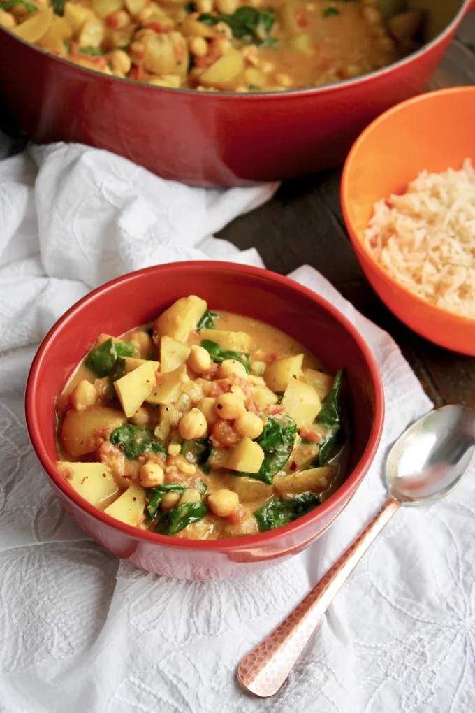 Potato, Chickpea, and Spinach Curry is a filling meatless dish! You'll want to enjoy this often!