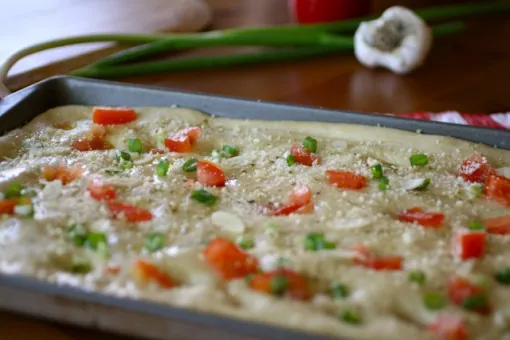 Ready to bake: Focaccia with Tomato, Green Onion and Garlic