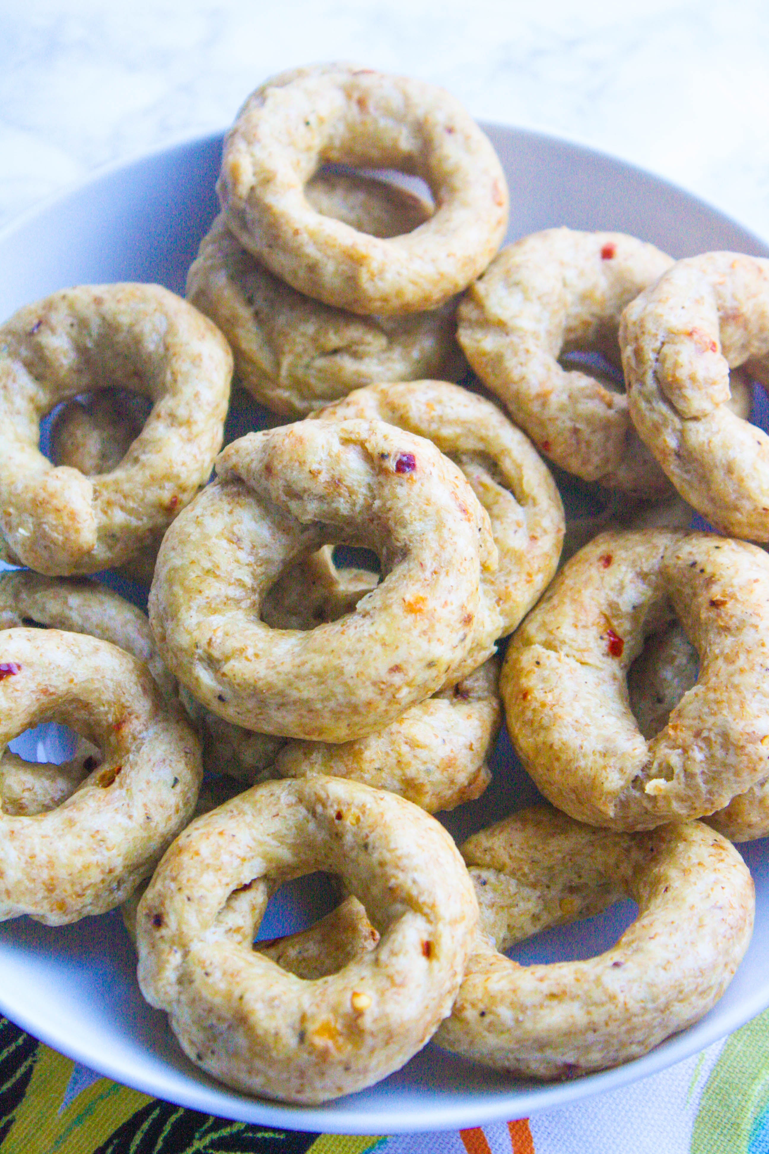 Red Pepper Italian Taralli (Breadstick Rings) are fun snacks to serve. You'll enjoy Red Pepper Italian Taralli (Breadstick Rings) as a traditional Italian snack.