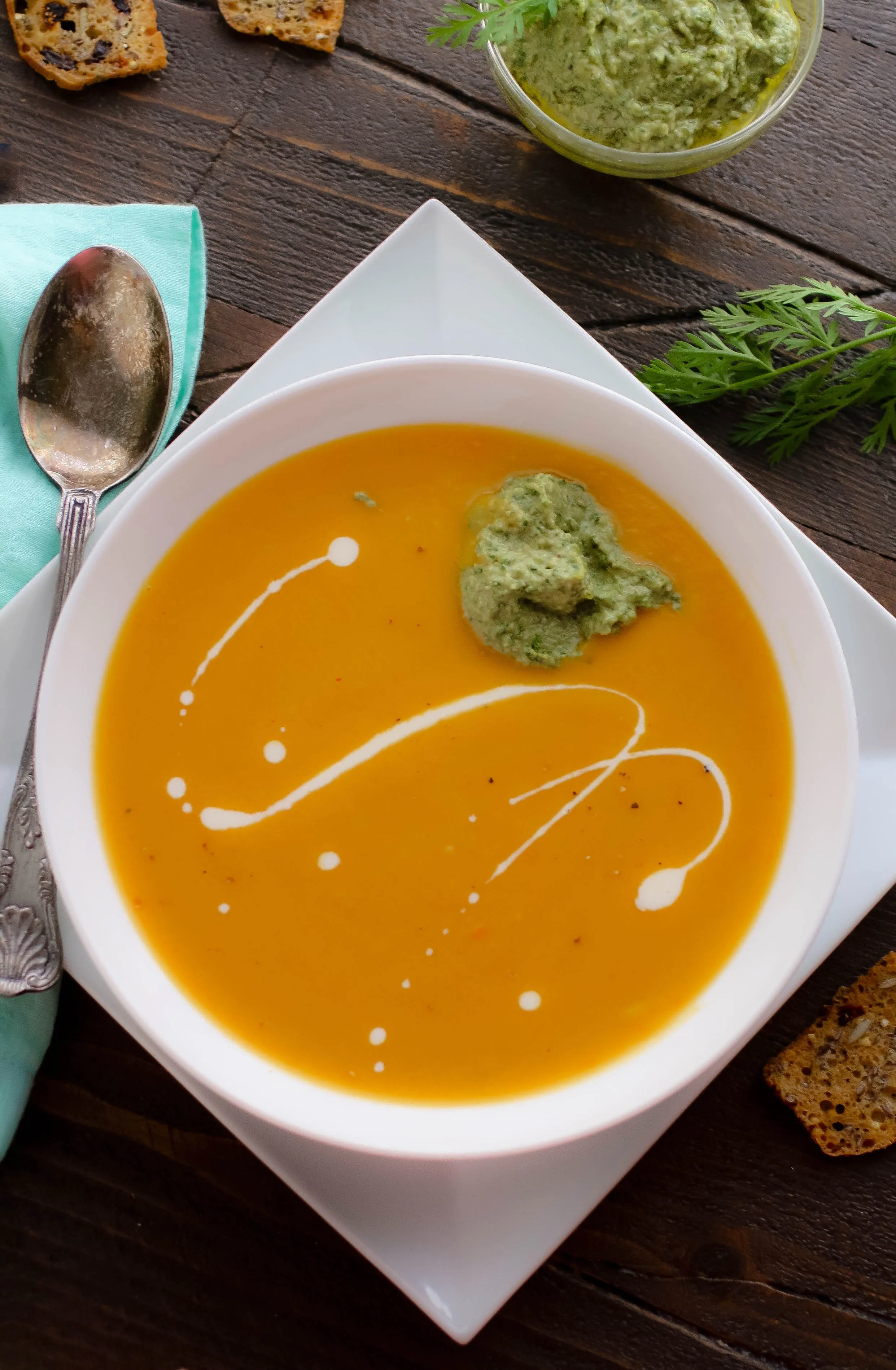 Roasted Carrot and Parsnip Soup with Carrot Greens Pesto is a tasty soup that is so easy to make! You'll love Roasted Carrot and Parsnip Soup with Carrot Greens Pesto for the creamy soup it is.