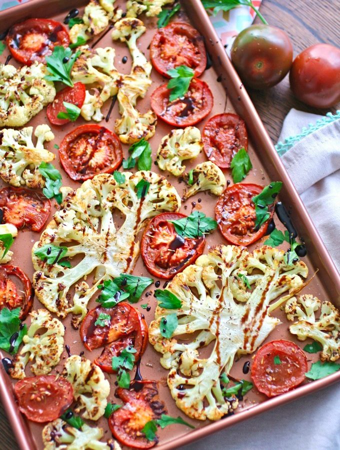 Roasted Cauliflower and Tomatoes with Balsamic Glaze is fabulous! You'll love it as a side, or as part of a meatless main dish!