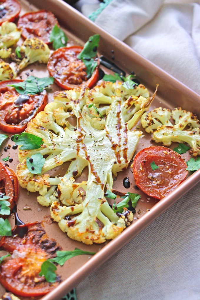 Roasted Cauliflower and Tomatoes with Balsamic Glaze is the perfect side. It takes little prep time, too -- so good!