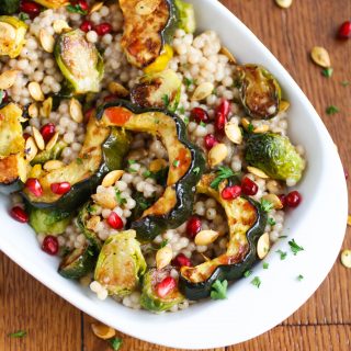 Roasted Fall Vegetable and Couscous Salad with Pomegranate Vinaigrette is a fabulous fall side dish. Serve this side dish all fall season!