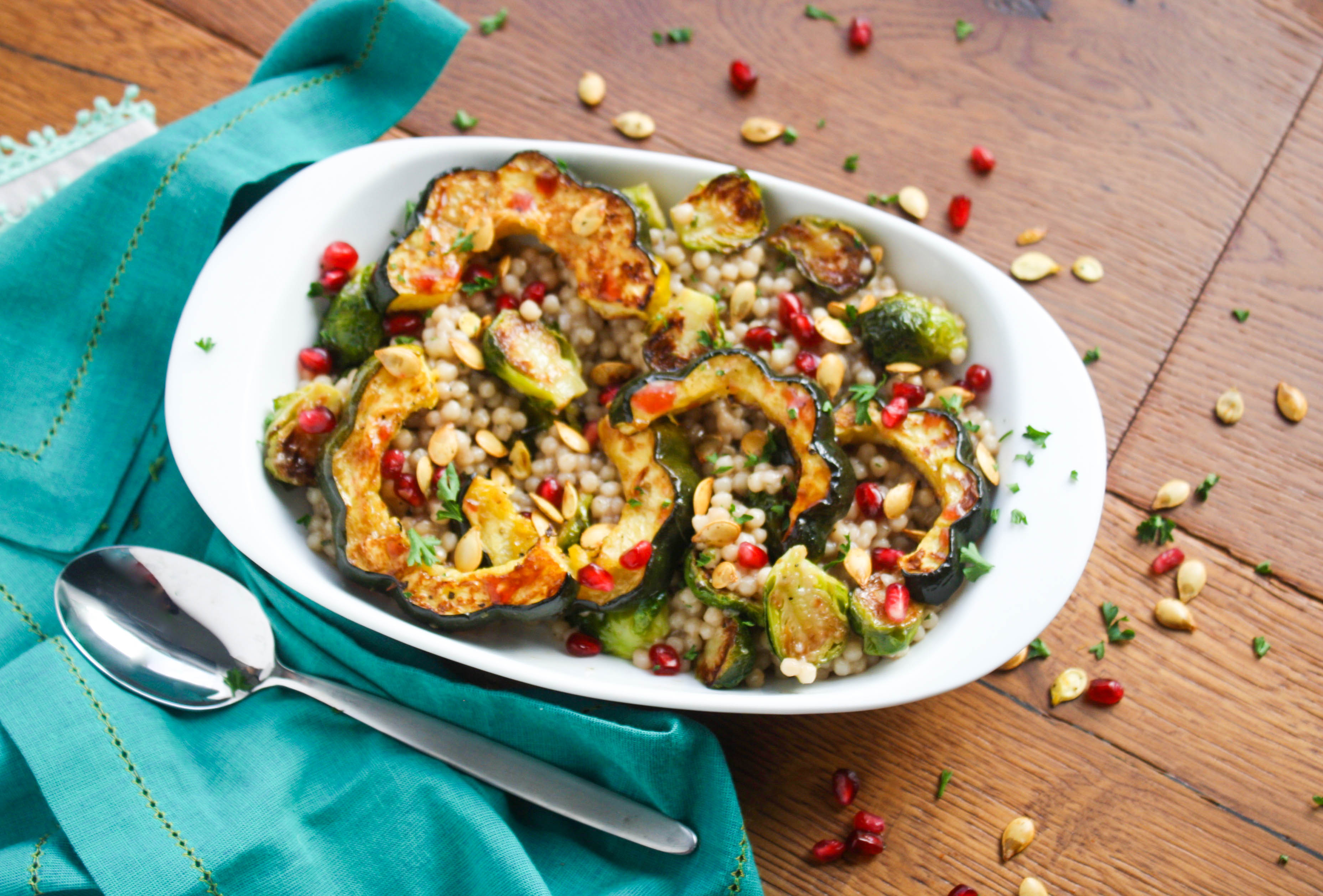 Roasted Fall Vegetable and Couscous Salad with Pomegranate Vinaigrette is a fabulous fall side dish for any day -- especially Thanksgiving! You'll love this seasonal side dish!