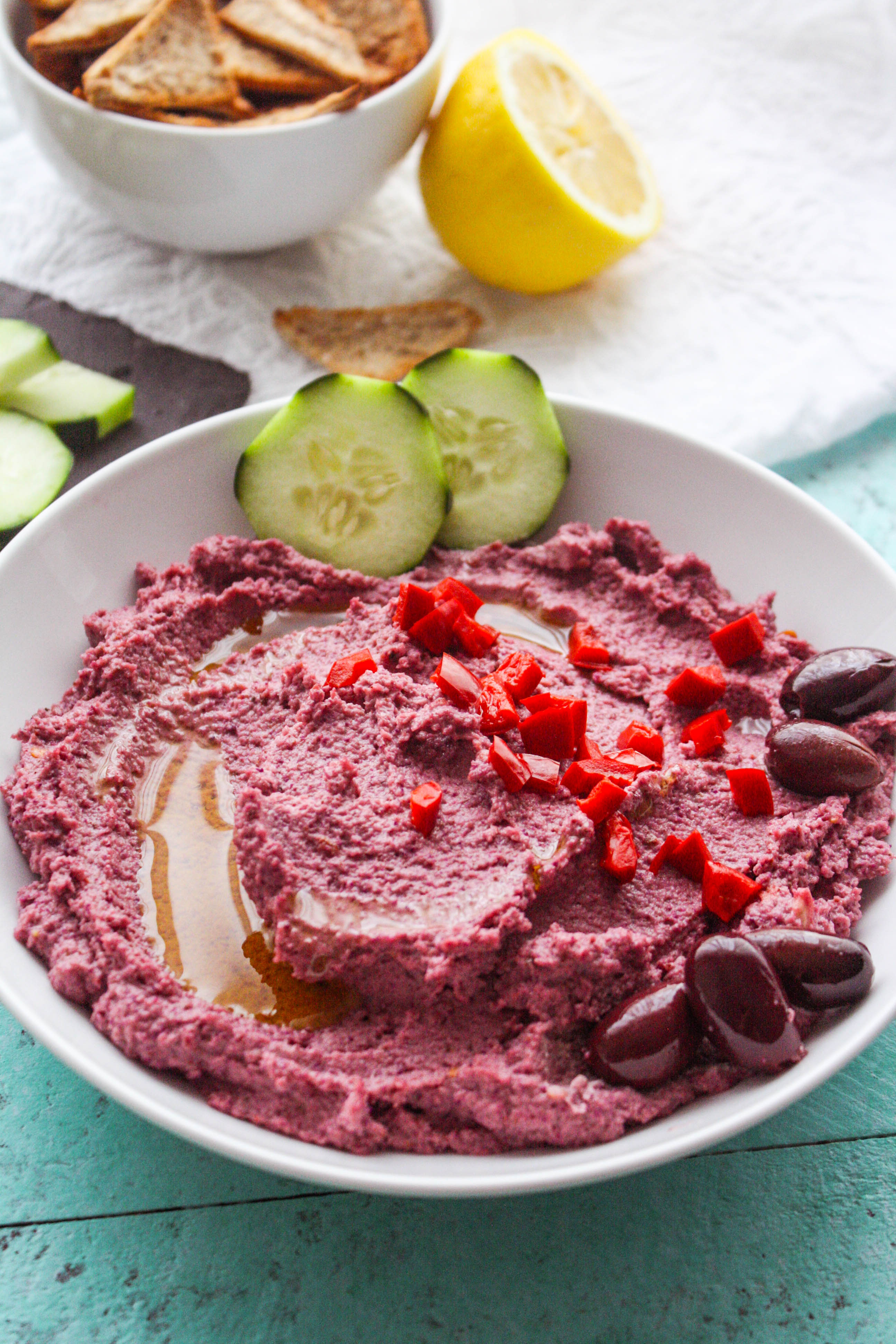 Roasted Garlic and Purple Cauliflower Hummus is a tasty dip that's perfect as a snack or appetizer. Roasted Garlic and Purple Cauliflower Hummus is a fun treat for any day.