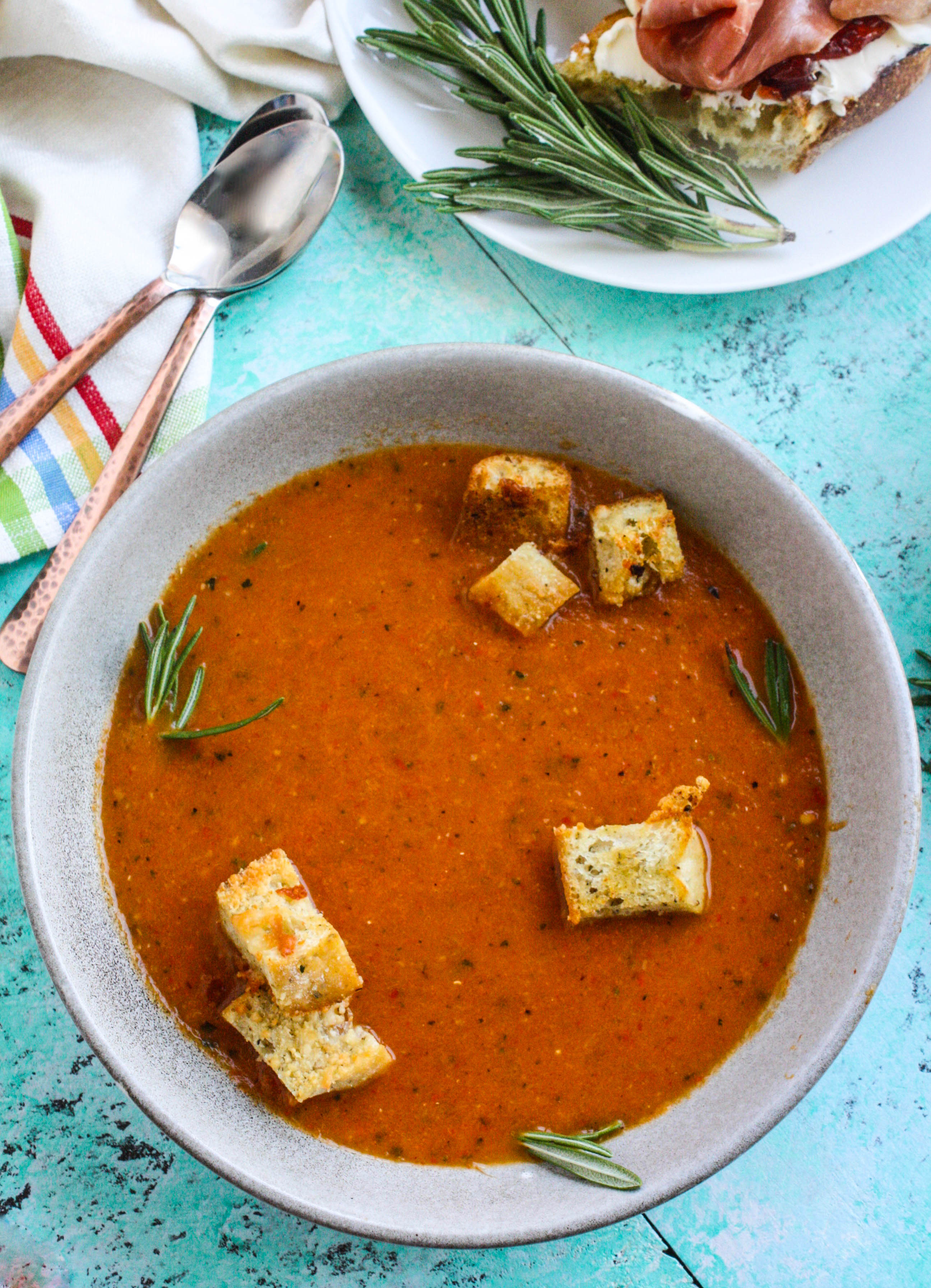 Roasted tomato and vegetable soup with gin drizzle is a great soup for the season. Roasted tomato and vegetable soup with gin drizzle is a flavorful and comforting soup for the season.
