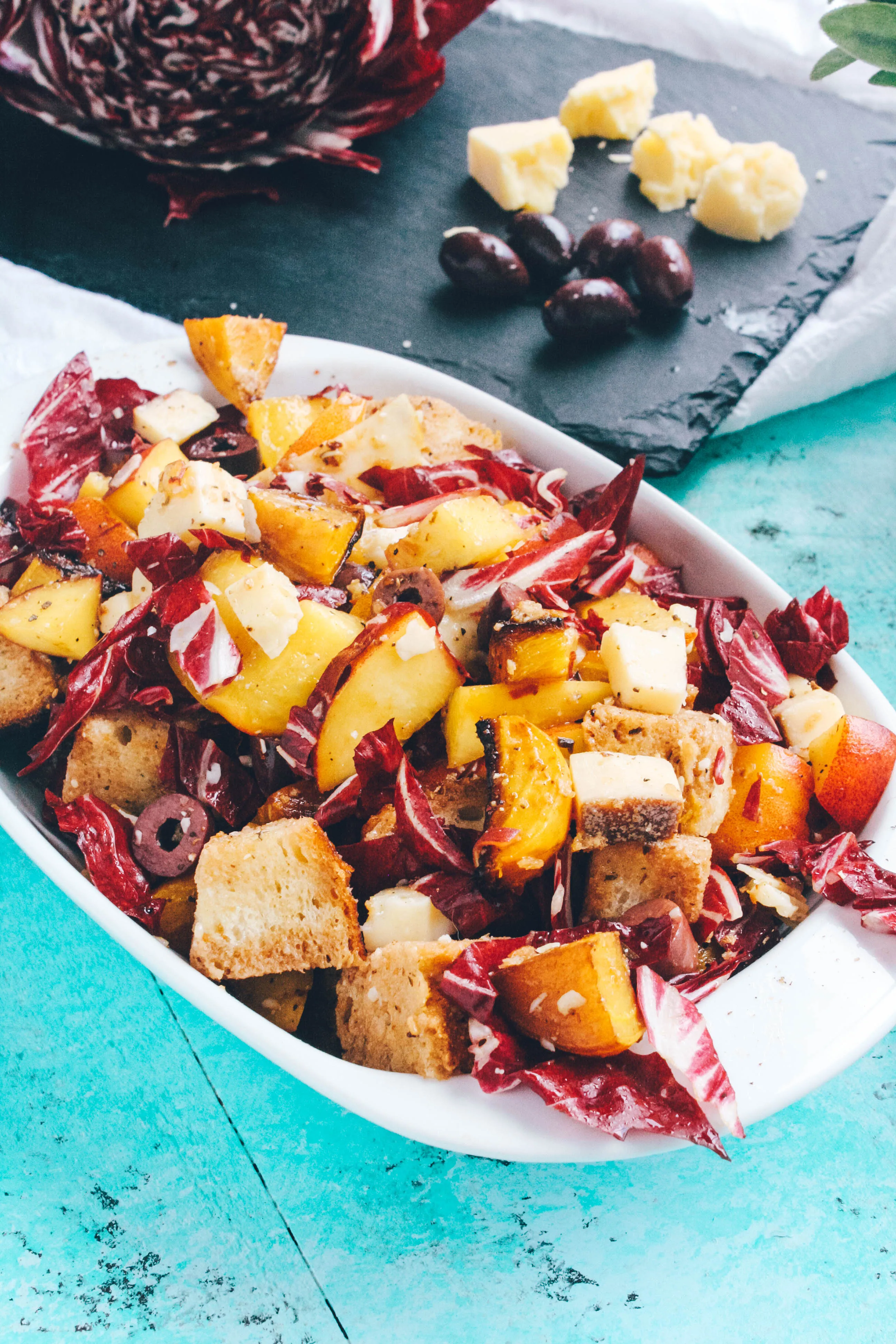 Roasted Beet, Peach & Radicchio Panzanella Salad is hearty and flavorful. Try Roasted Beet, Peach & Radicchio Panzanella Salad this season for a new go-to salad.