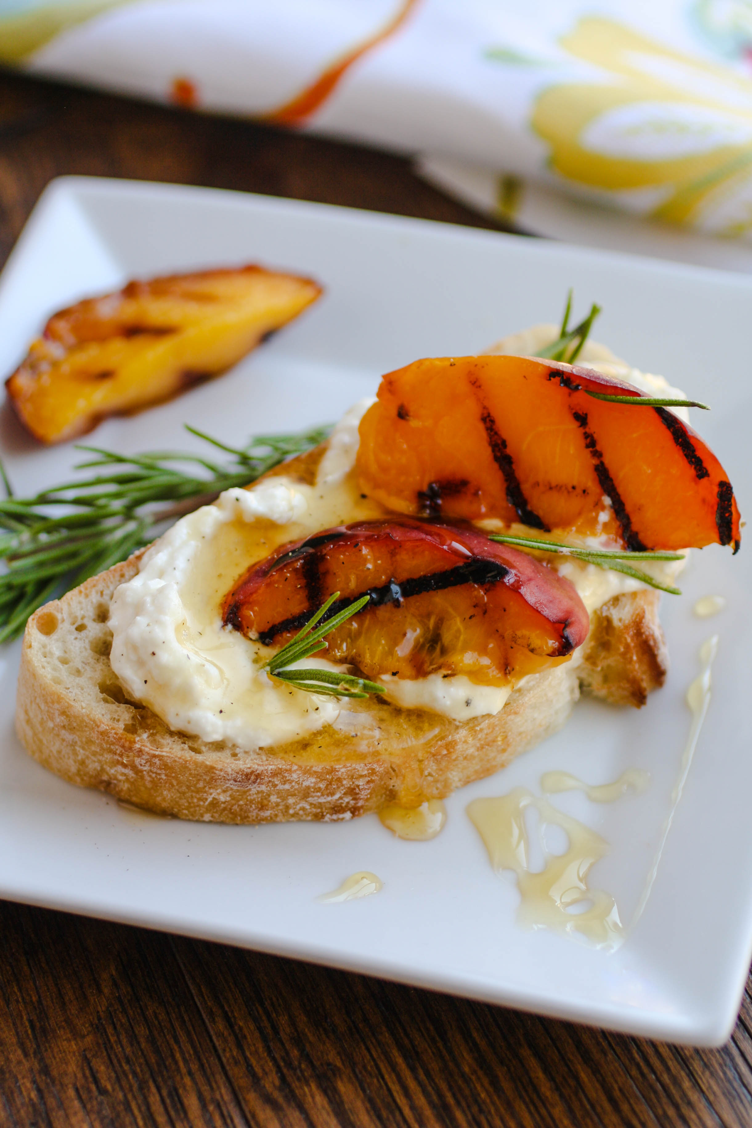 Rosemary Whipped Feta with Grilled Peaches and Honey is a wonderful appetizer, perfect for any party!