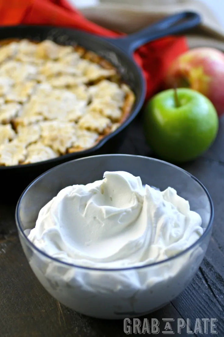 A bowl of Salted Caramel Whipped Topping to add to Skillet Apple Pie - perfect as a Thanksgiving treat!