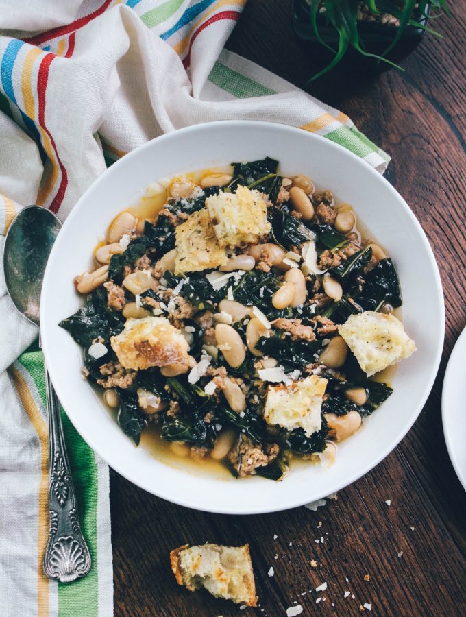 Sausage, Kale, and White Bean Soup with Rosemary-Parmesan Croutons is a fabulous and filling dish! You'll love this Sausage, Kale, and White Bean Soup with Rosemary-Parmesan Croutons!