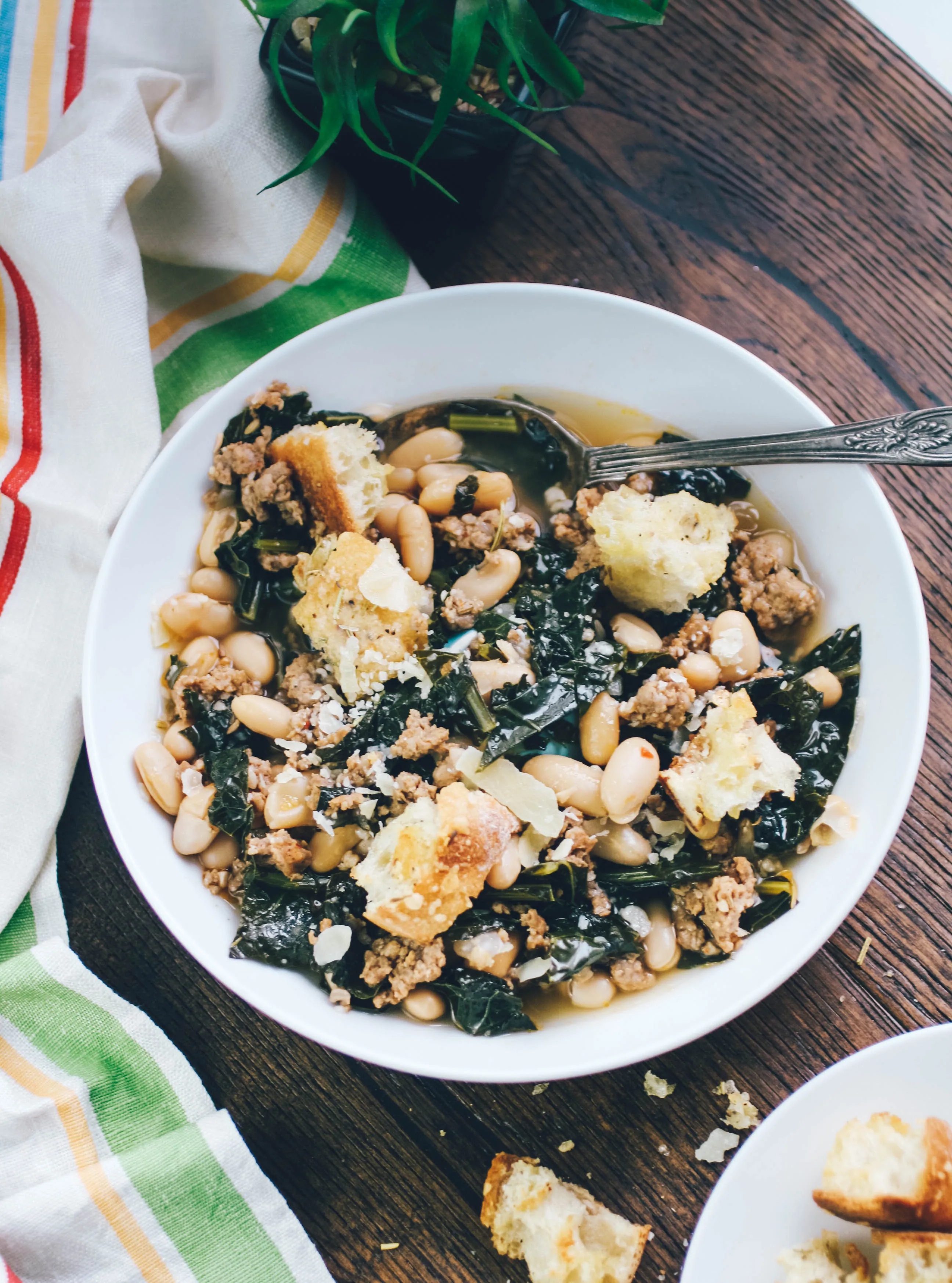 Sausage, Kale, and White Bean Soup with Rosemary-Parmesan Croutons is a tasty dish that's easy to make. If you love soup, you'll love Sausage, Kale, and White Bean Soup with Rosemary-Parmesan Croutons!
