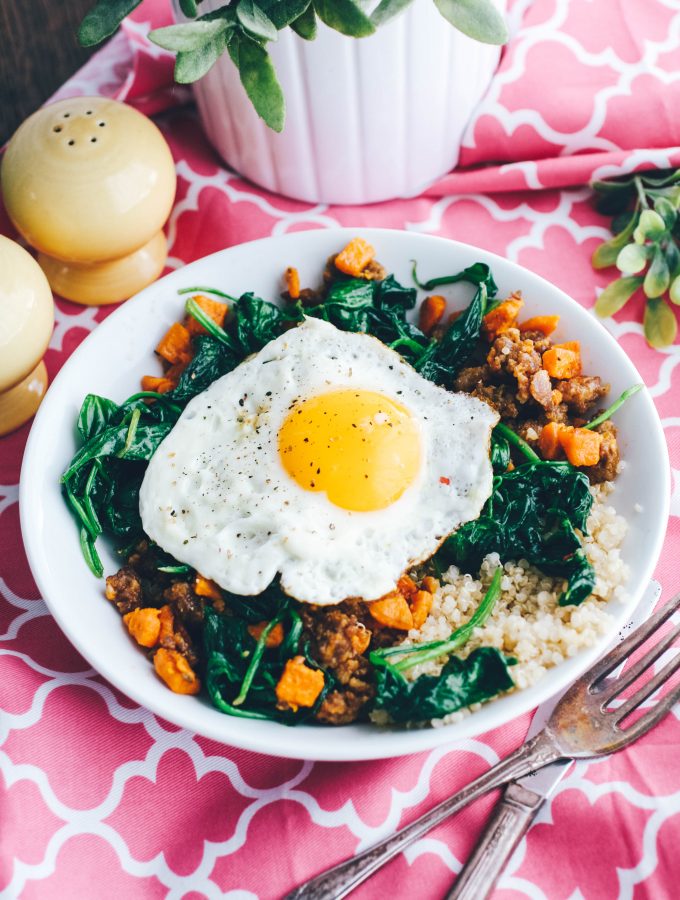 Sausage, Sweet Potato & Spinach Quinoa Bowls with Egg make a wonderful breakfast (or dinner)! You'll love these Sausage, Sweet Potato & Spinach Quinoa Bowls with Egg.
