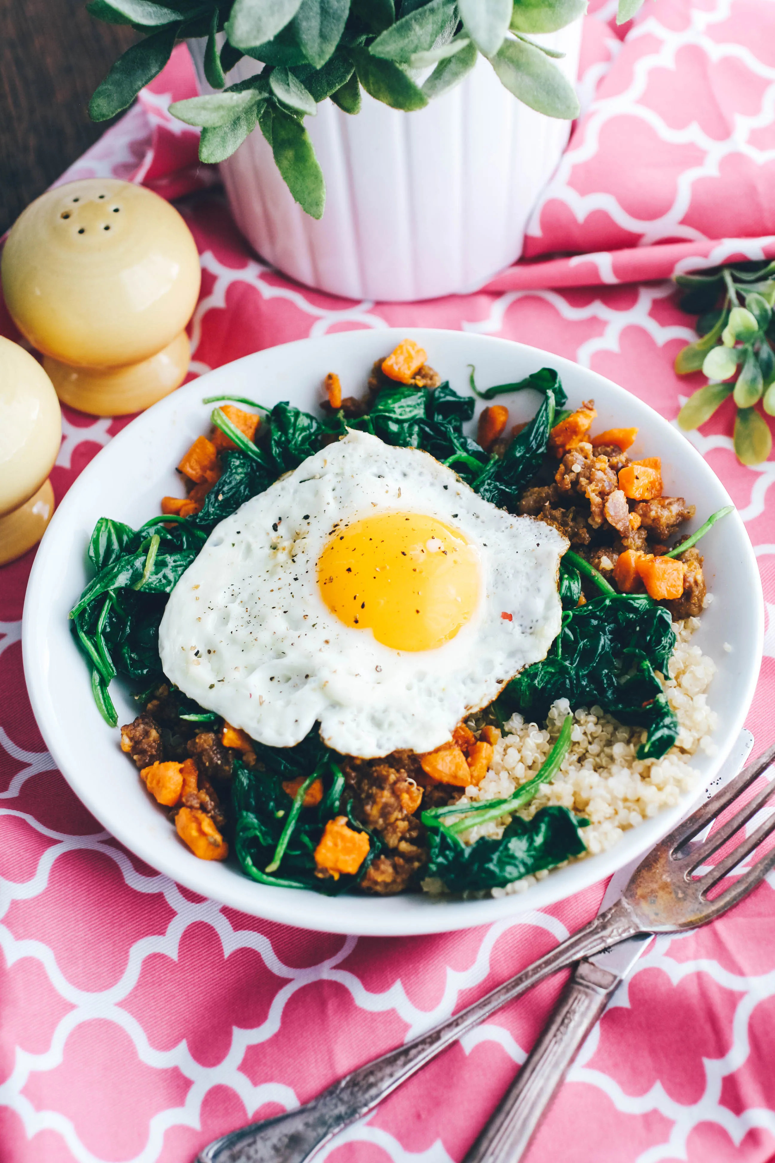 Sausage, Sweet Potato & Spinach Quinoa Bowls with Egg make a wonderful breakfast (or dinner)! You'll love these Sausage, Sweet Potato & Spinach Quinoa Bowls with Egg.
