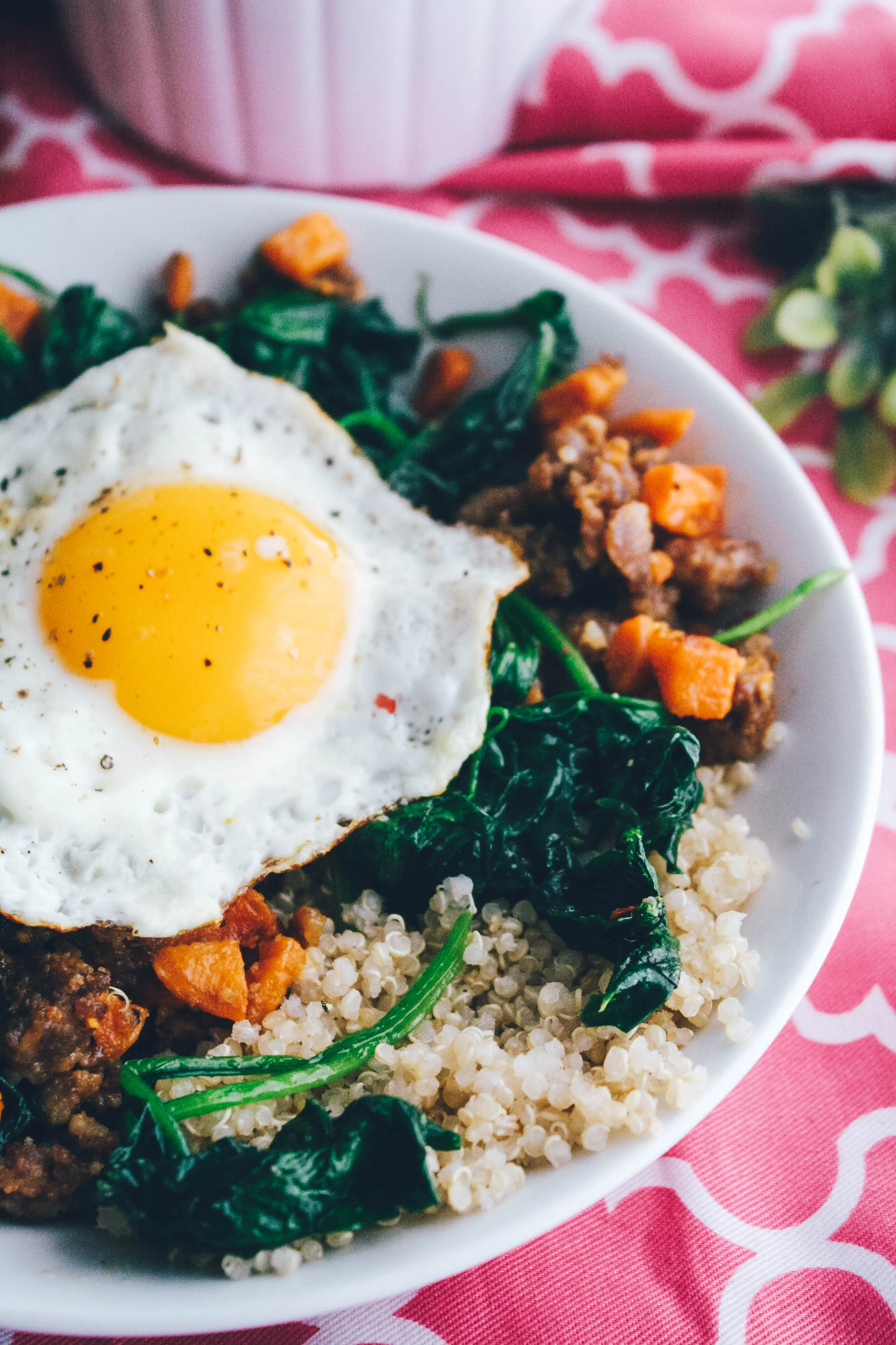 Sausage, Sweet Potato & Spinach Quinoa Bowls with Egg make a wonderful and filling meal. Sausage, Sweet Potato & Spinach Quinoa Bowls with Egg are filling and flavorful!