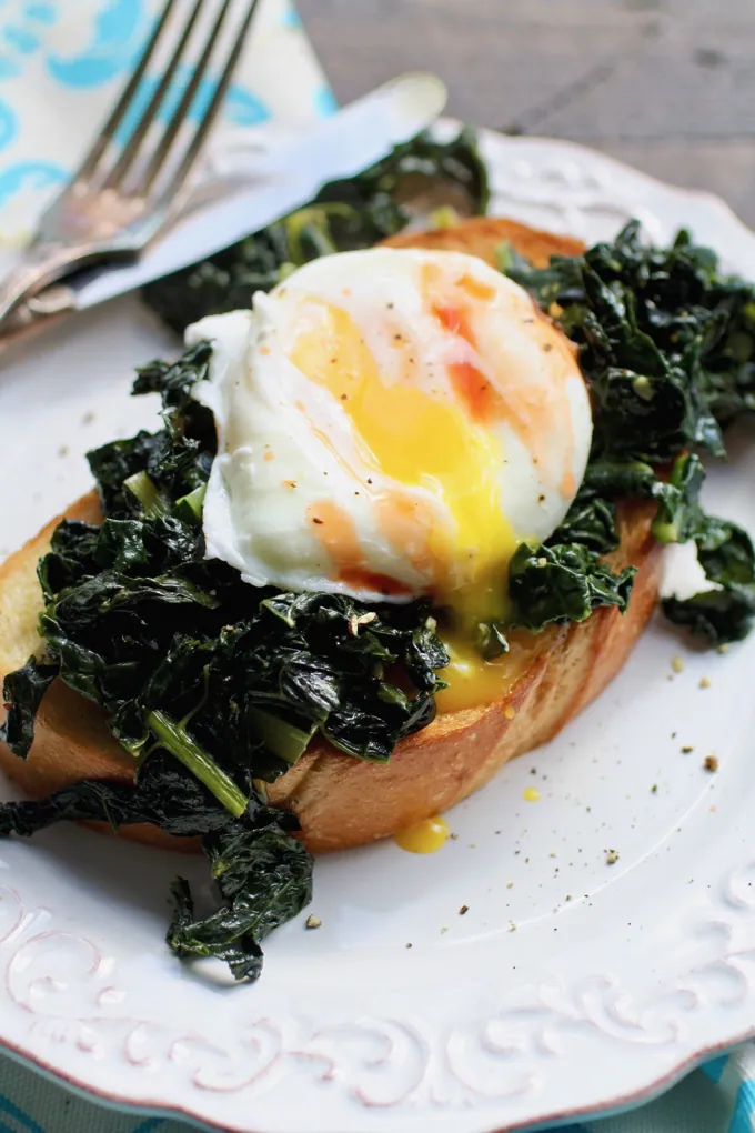 Sauteed Kale on Toast with Poached Eggs is a breakfast treat. You'll want to make this dish today!