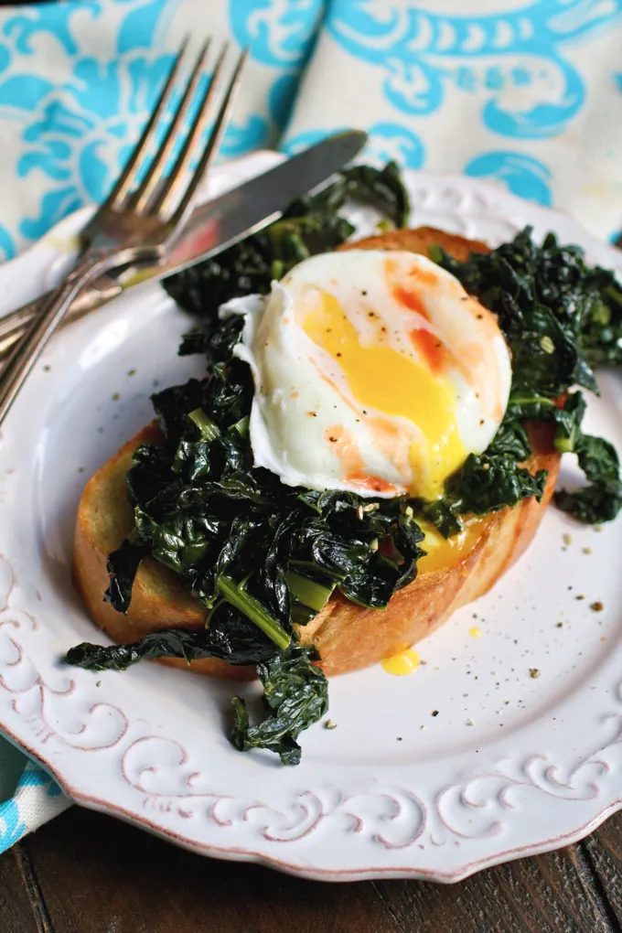 Sauteed Kale on Toast with Poached Eggs is a great breakfast dish. Poached eggs for the win!