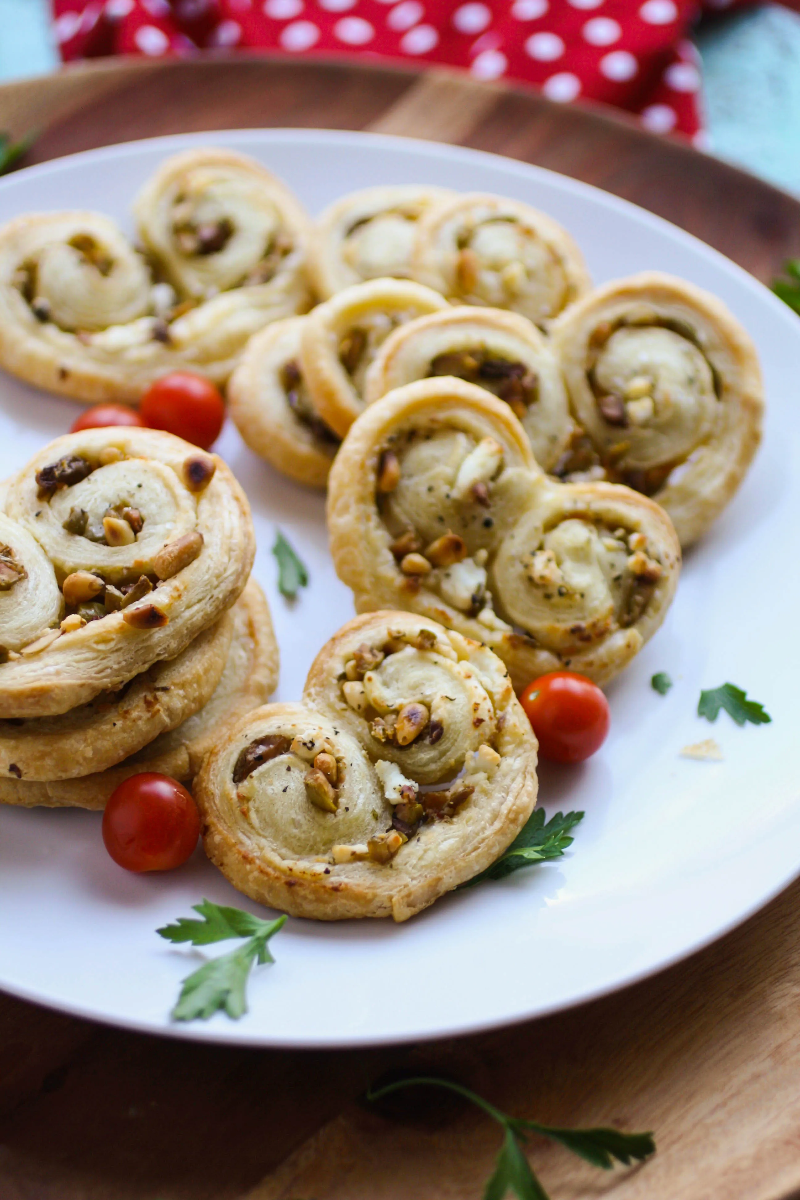 Savory Olive and Goat Cheese Palmiers are a fun treat. They're great for a get together.