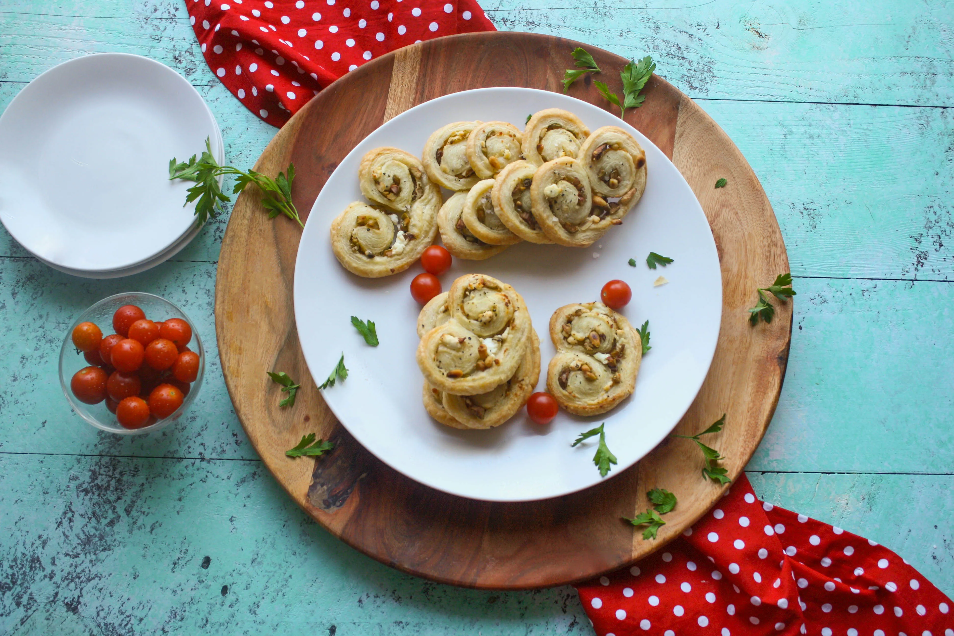 Savory Olive and Goat Cheese Palmiers are a fun snack to share. They're so easy to make, too!