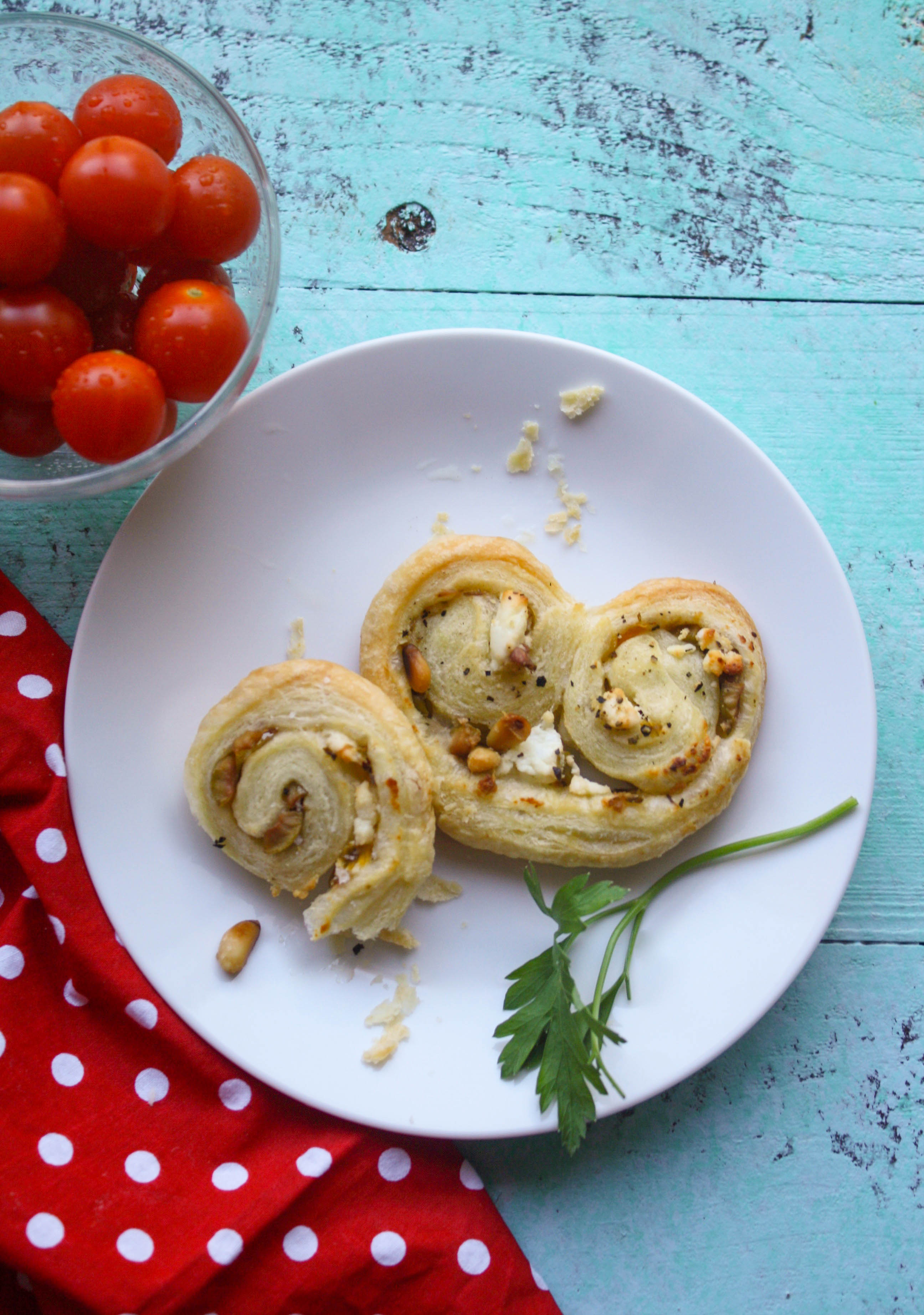 Savory Olive and Goat Cheese Palmiers are flaky and tasty! You'll love the goodies tucked inside. They make the perfect appetizer.