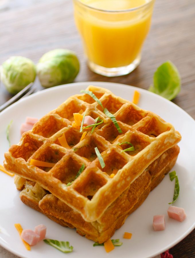 Savory waffles with ham, cheddar, and Brussels sprouts are perfect for leftovers! You'll love this combo!