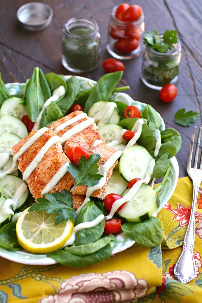 Salads are perfect for summer meals, especially when you include salmon, spinach, and a creamy, dairy-free herbed dressing1