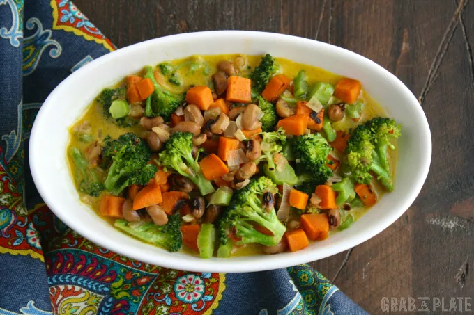 A bowl of Sweet Potato & Black-Eyed Pea Curry makes a colorful addition to your table.