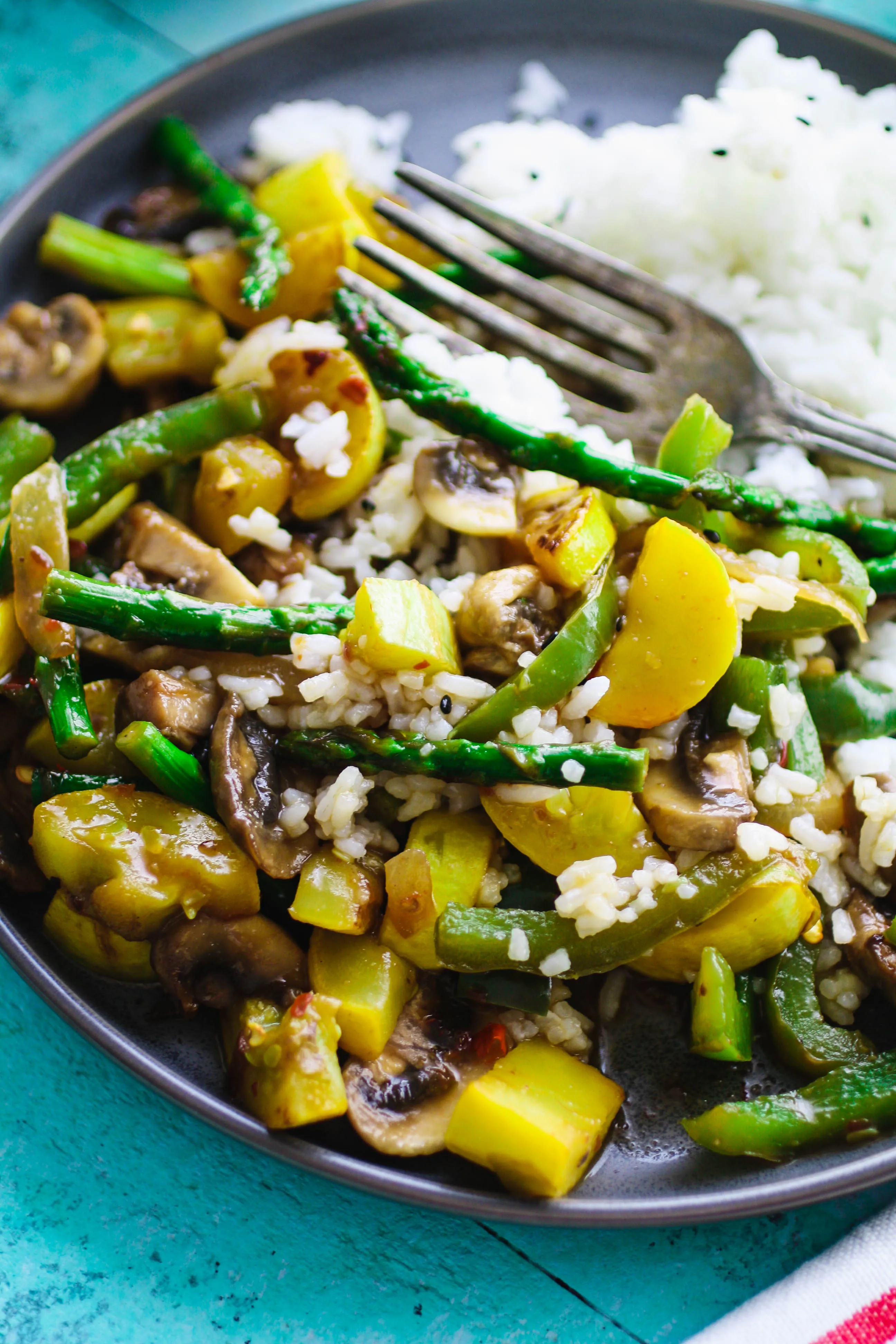 Simple Sweet & Spicy Vegetable Stir Fry is a delightful dish that is filling and flavorful. Simple Sweet & Spicy Vegetable Stir Fry is a tasty meatless meal for any night of the week.