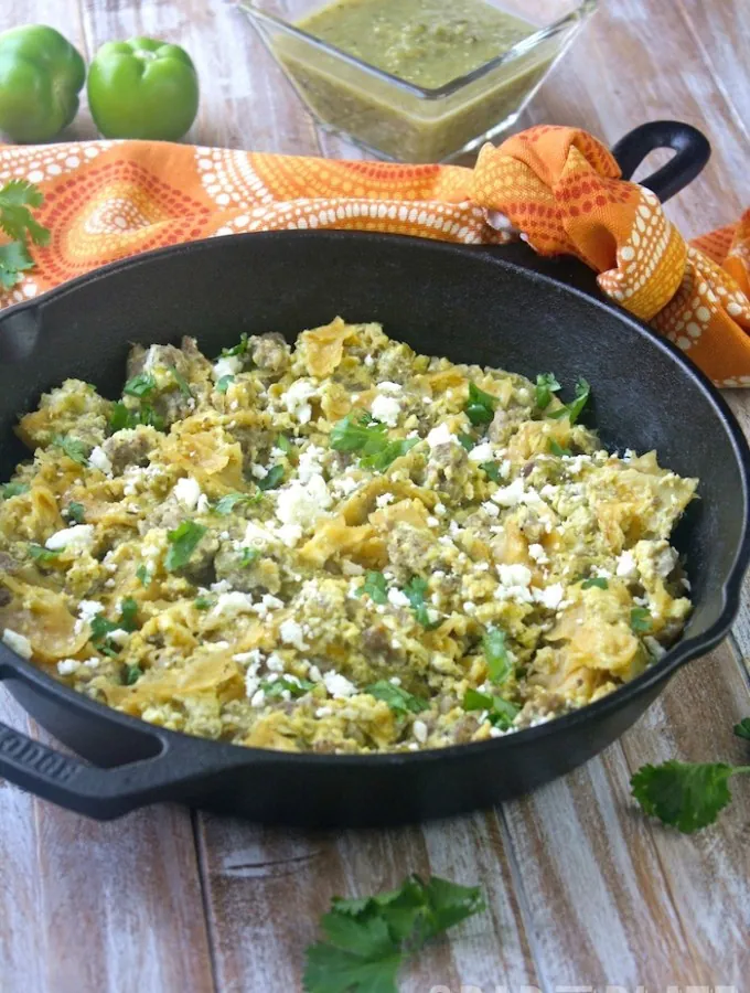 Enjoy breakfast and serve Skillet Pork Migas with Roasted Tomatillo Salsa