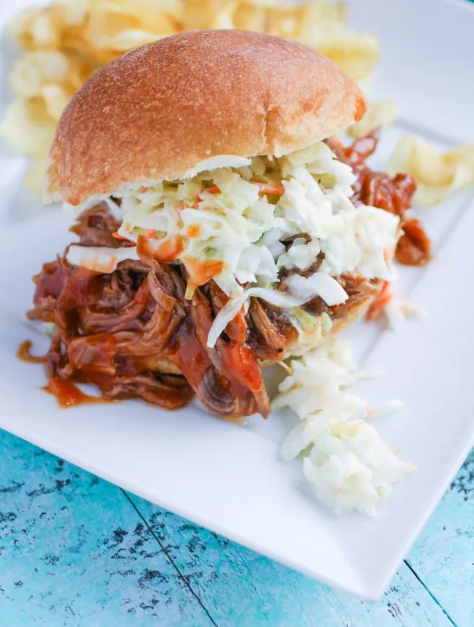 Slow Cooker BBQ Beef Sandwiches are a crowd pleaser! These sandwiches are so easy to make, and you'll love the BBQ sauce!
