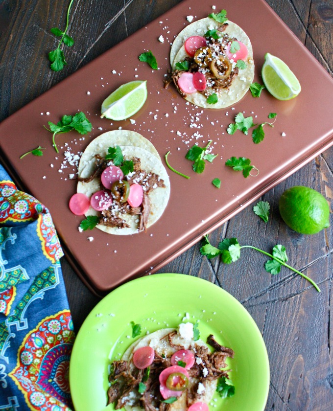 You'll really enjoy these Slow Cooker Beef Carnitas Tacos with Spicy Pickled Radishes!