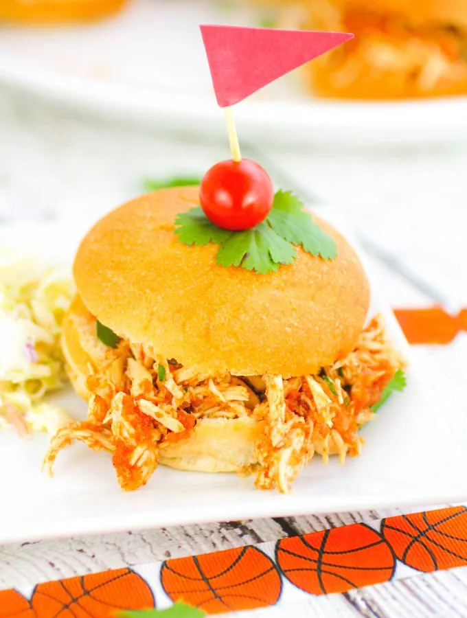 Slow Cooker Southwestern Pulled Chicken Sandwiches are perfect for parties. Make a batch of Slow Cooker Southwestern Pulled Chicken Sandwiches for the big game.