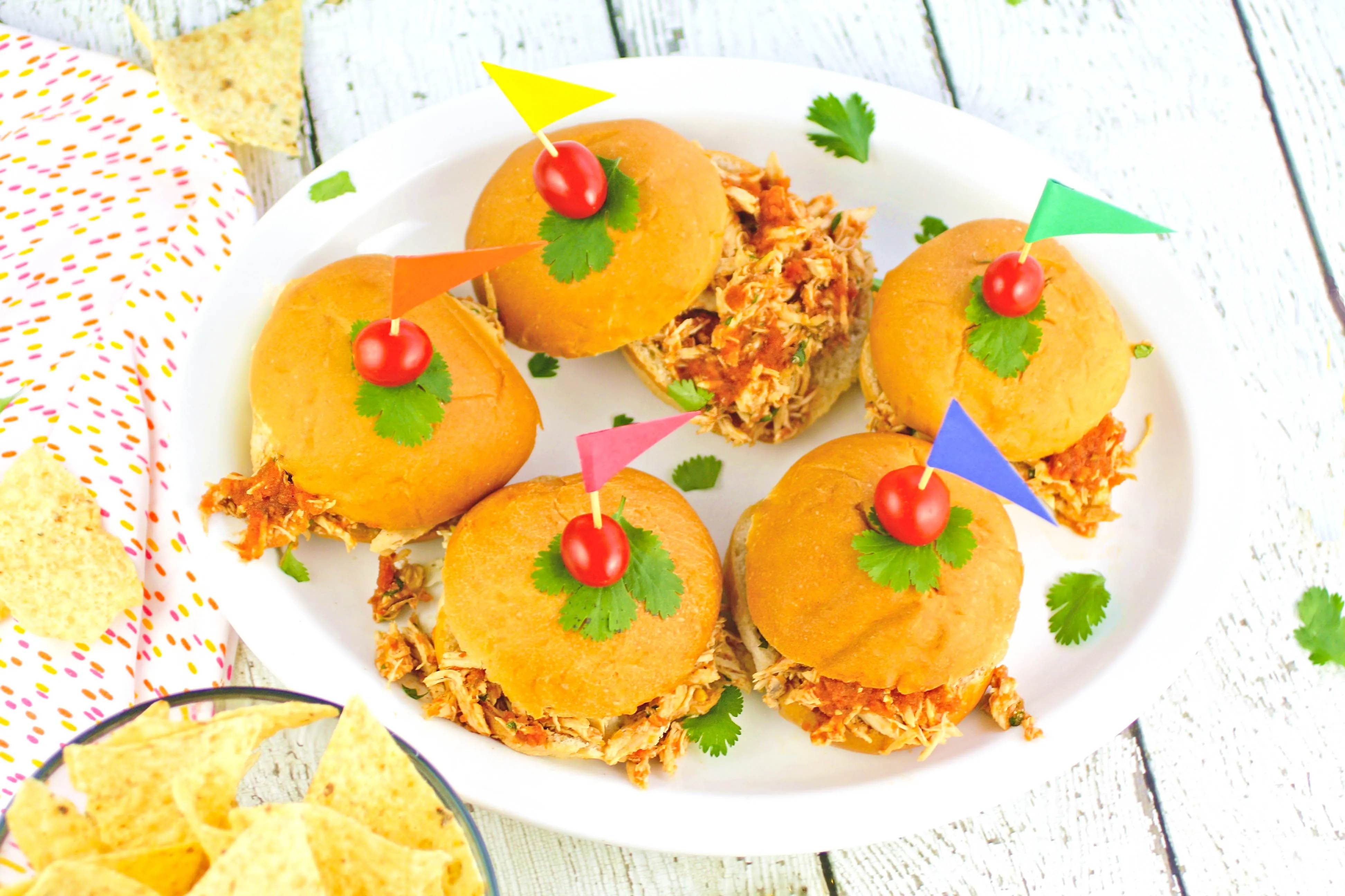 Slow Cooker Southwestern Pulled Chicken Sandwiches will feed a crowd! Slow Cooker Southwestern Pulled Chicken Sandwiches are perfect when you've got a crowd together.