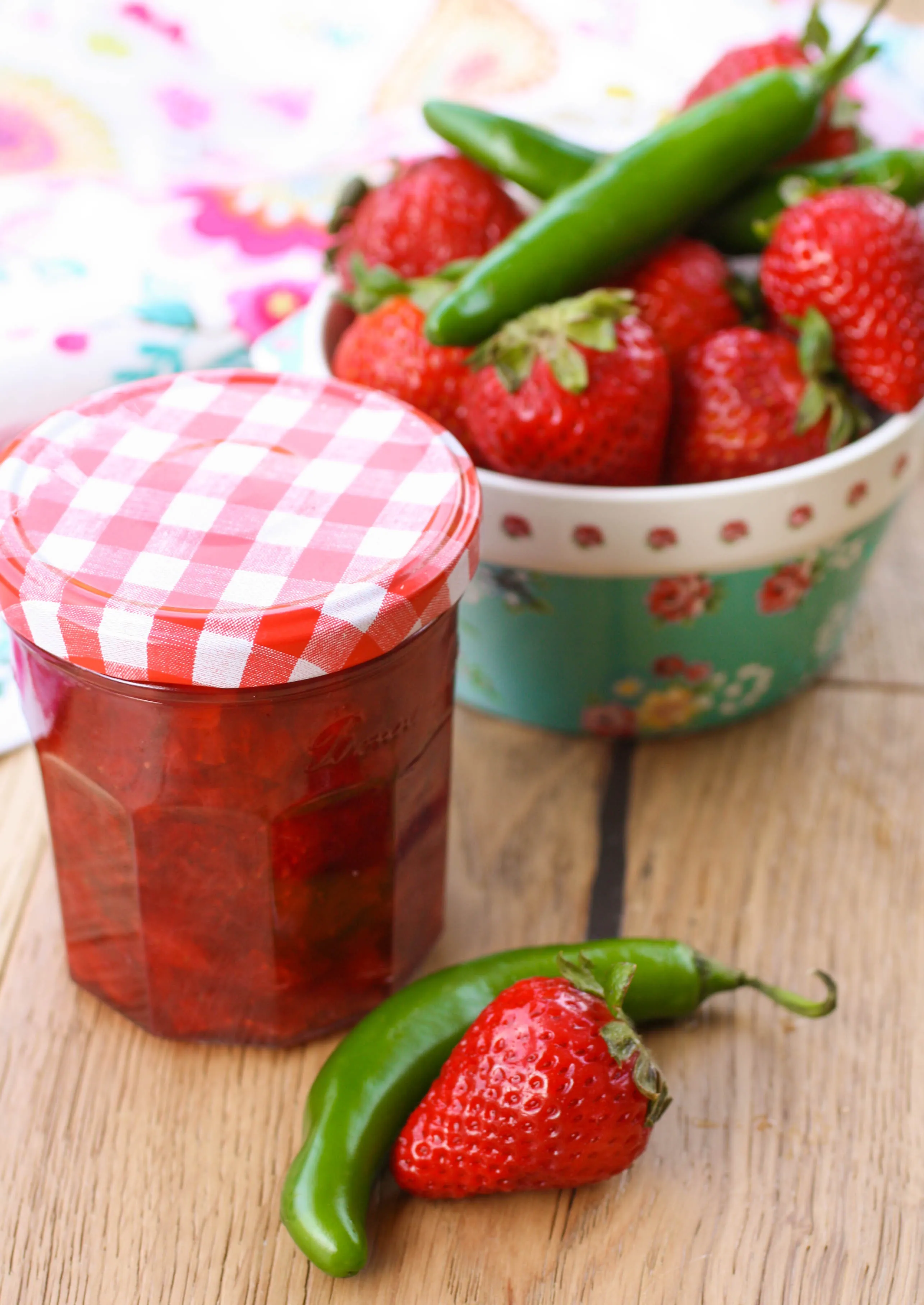 Small Batch Strawberry-Serrano Refrigerator Jam is a fun treat for the family! This seasonal jam is so easy to make, too!