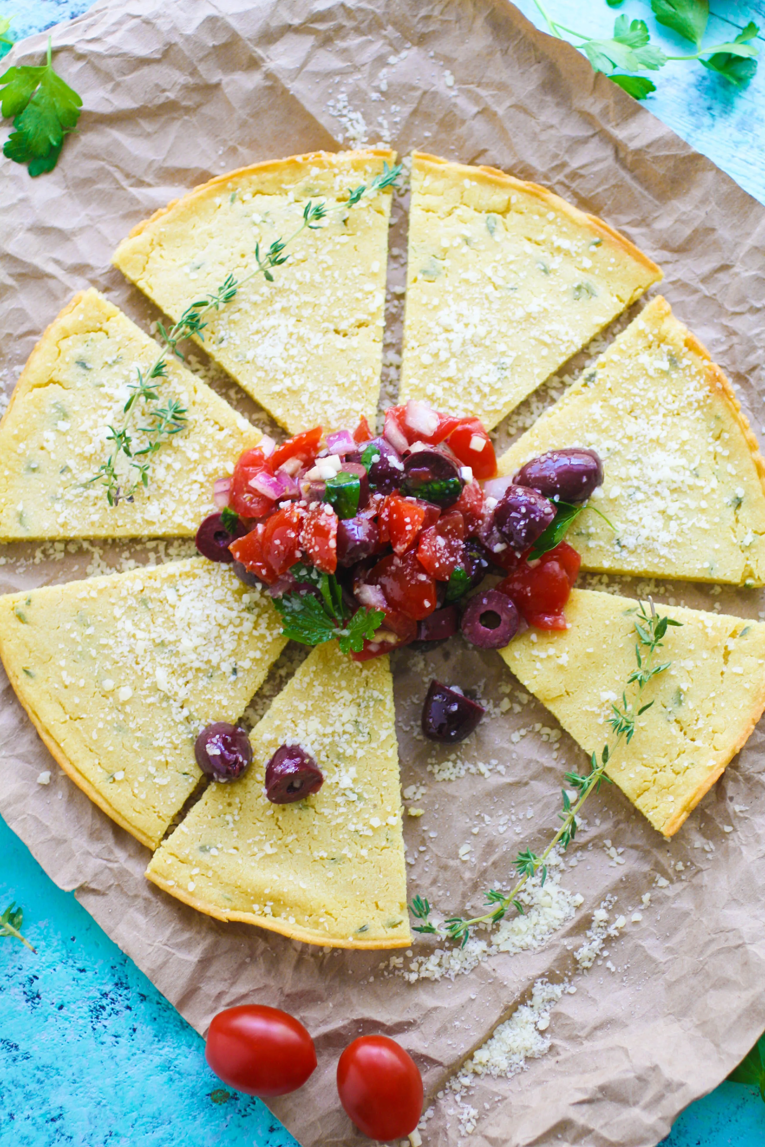 Socca (Chickpea Flour) Flatbread with Tomato and Olive Salad make a wonderful snack between meals. Socca (Chickpea Flour) Flatbread with Tomato and Olive Salad is perfect for a snack, or as an appetizer -- you decide!