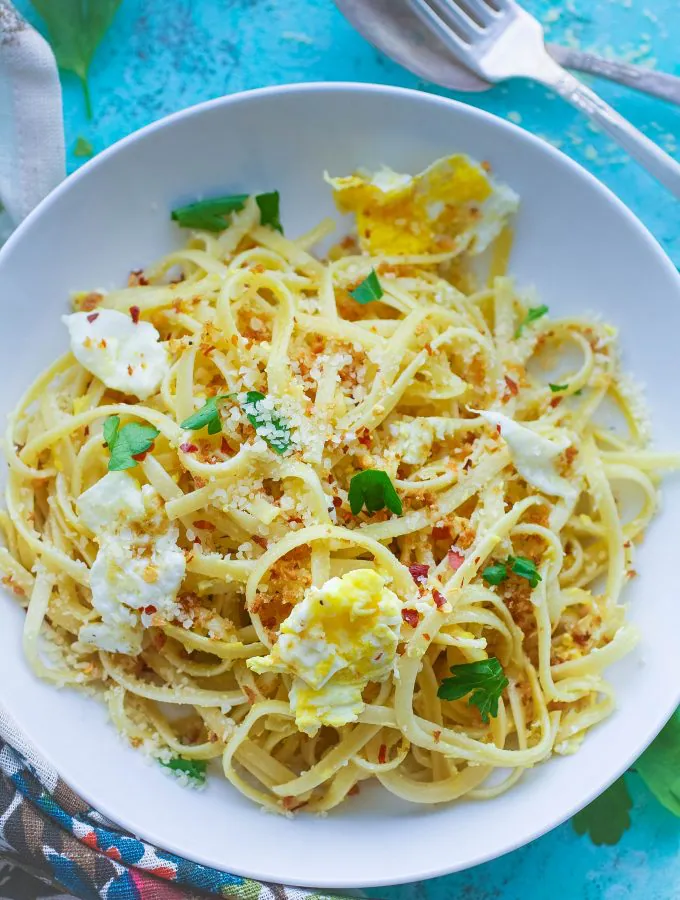 Spaghetti with Fried Eggs and Crunchy Breadcrumbs is a simple dish you'll enjoy. Spaghetti with Fried Eggs and Crunchy Breadcrumbs is a meatless and easy-to-make dish you'll love.