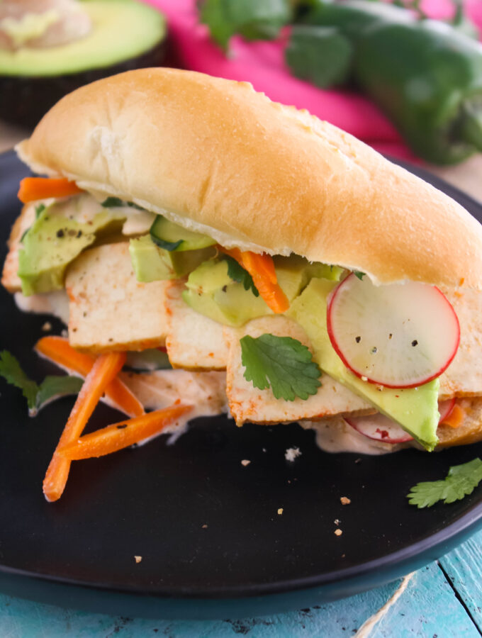 Spicy Tofu Banh Mi Sandwiches are plated and ready to serve.