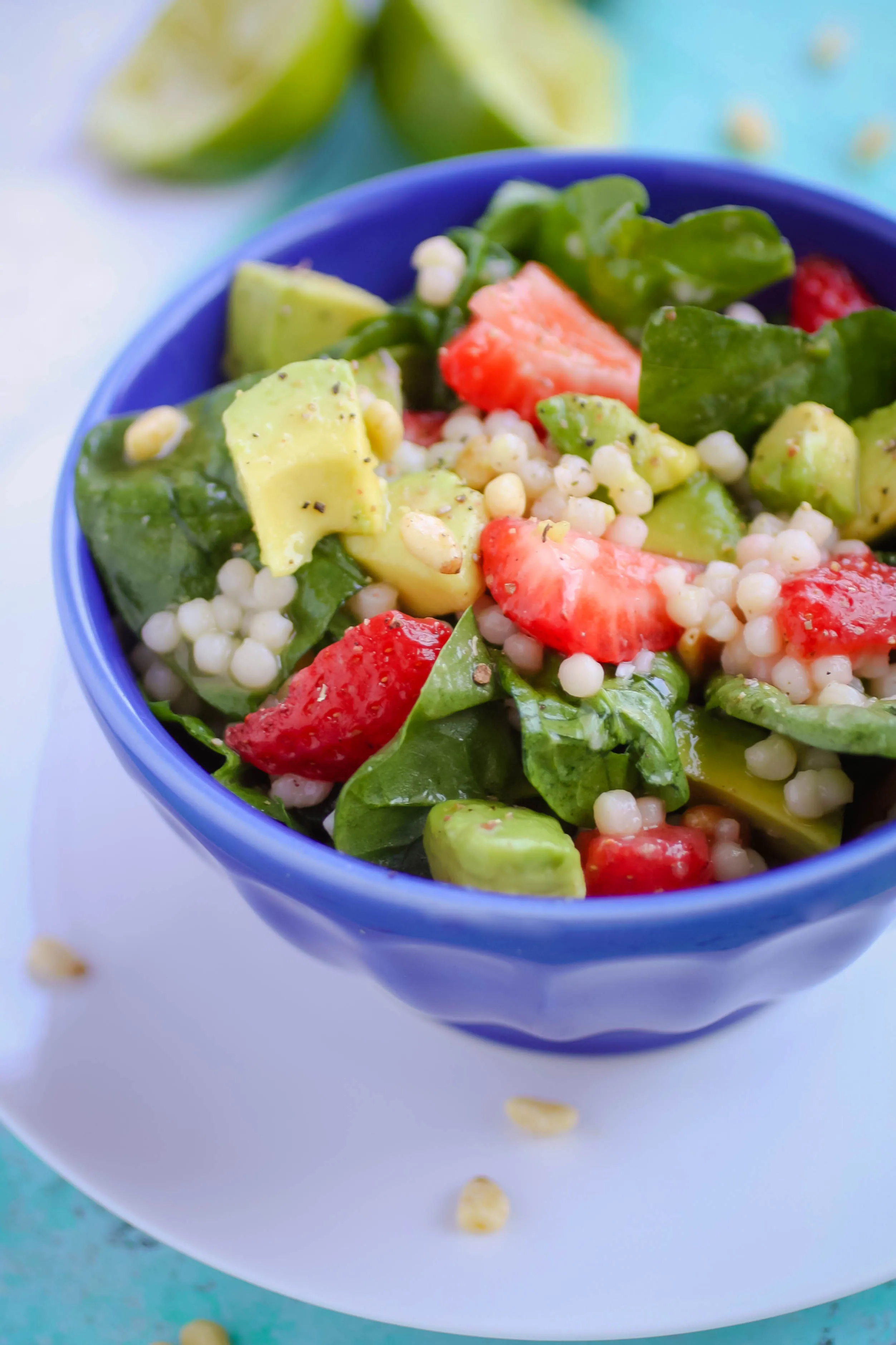 Spinach and Couscous Salad with Strawberries, Avocado & Honey-Lime Dressing is a wonderful salad for the summer. Spinach and Couscous Salad with Strawberries, Avocado & Honey-Lime Dressing is a salad you need to toss together today!