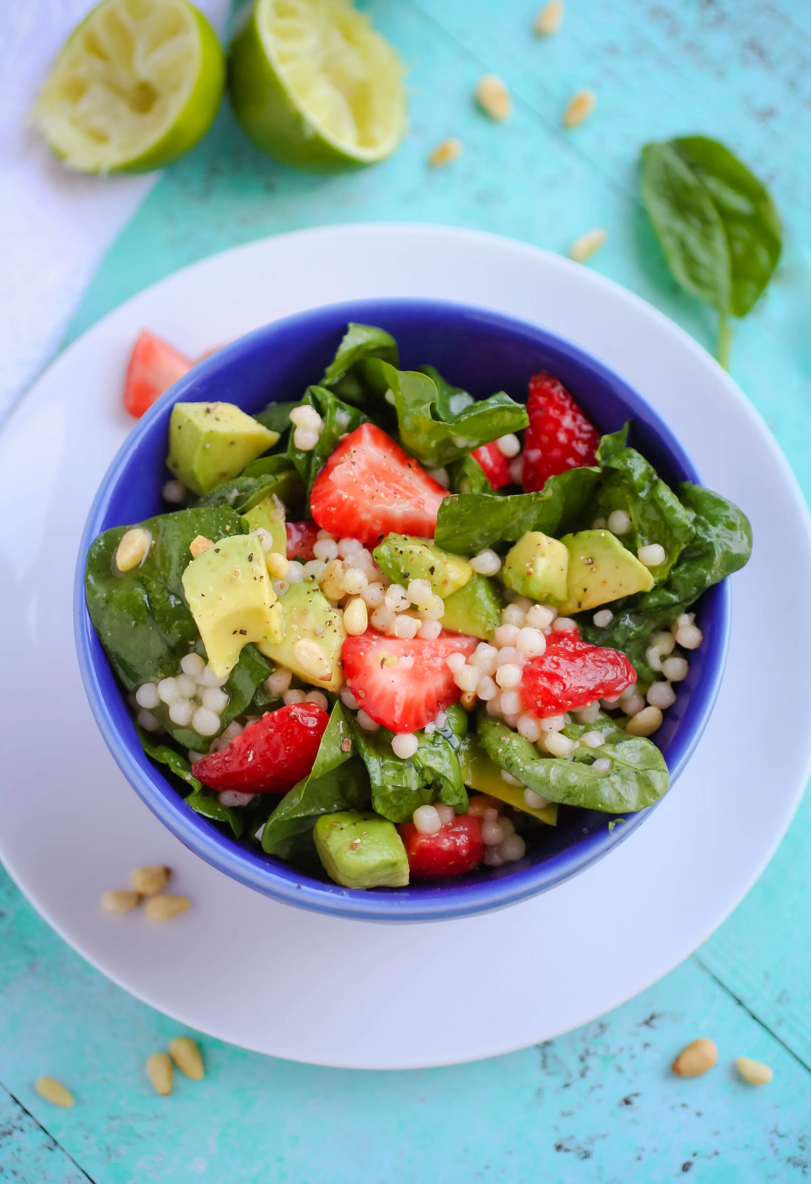 Spinach and Couscous Salad with Strawberries, Avocado & Honey-Lime Dressing is my new favorite summer salad. Spinach and Couscous Salad with Strawberries, Avocado & Honey-Lime Dressing is full of flavor and color!