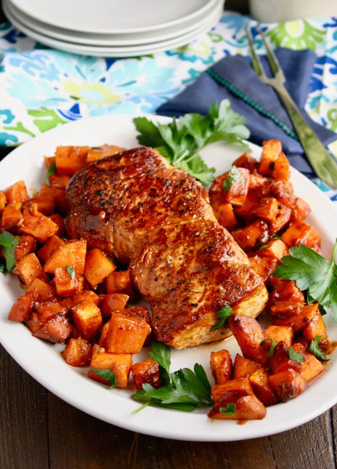 Serve it at the holidays, or on a weeknight! It's so easy to make Sriracha-Roasted Pork with Sweet Potatoes with just 4 ingredients!