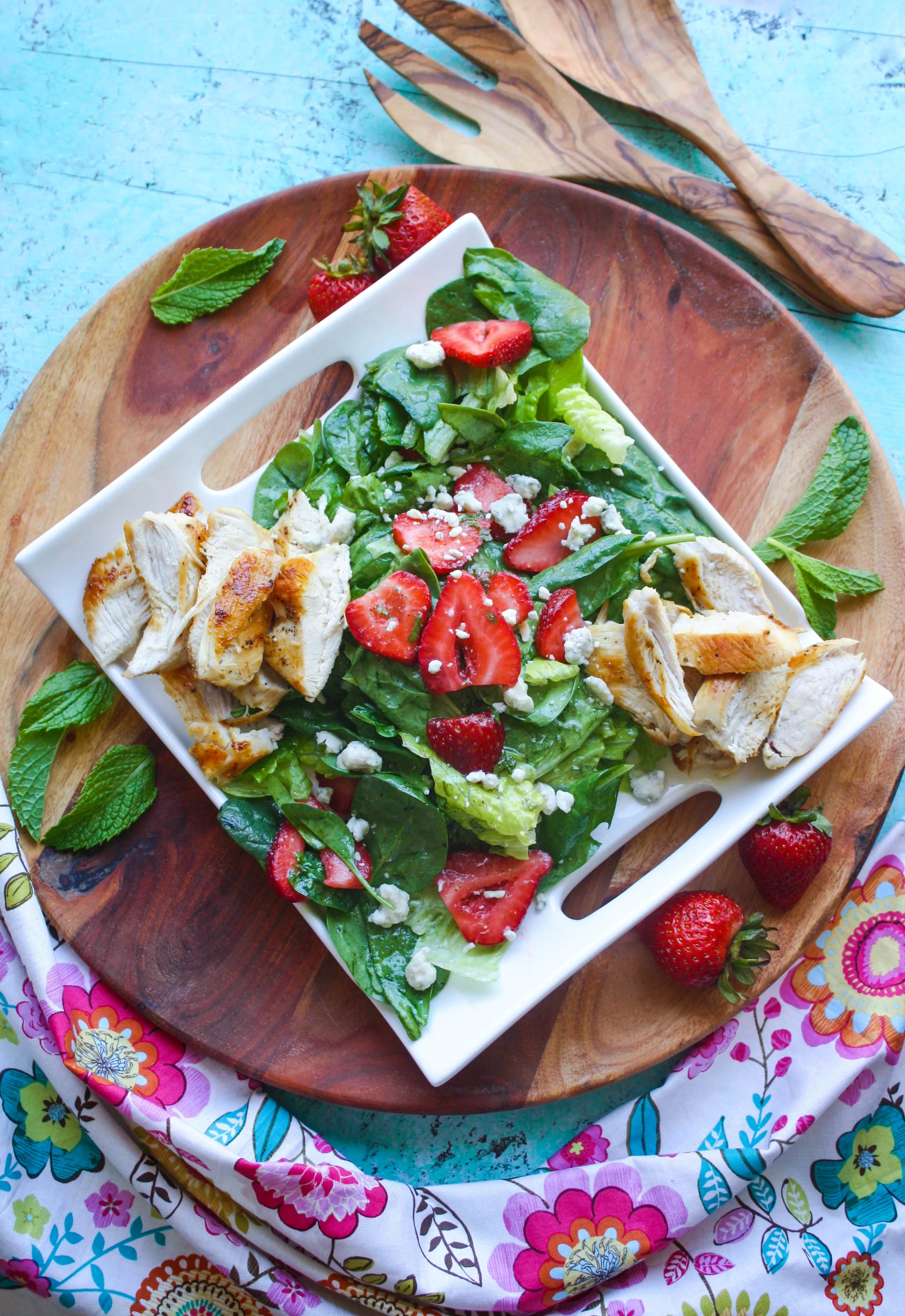 Chicken Salad with Strawberries and Honey-Lemon Mint Dressing is a fabulous salad to try this season. You'll love the homemade dressing, sweet strawberries, and how easy it is to make!