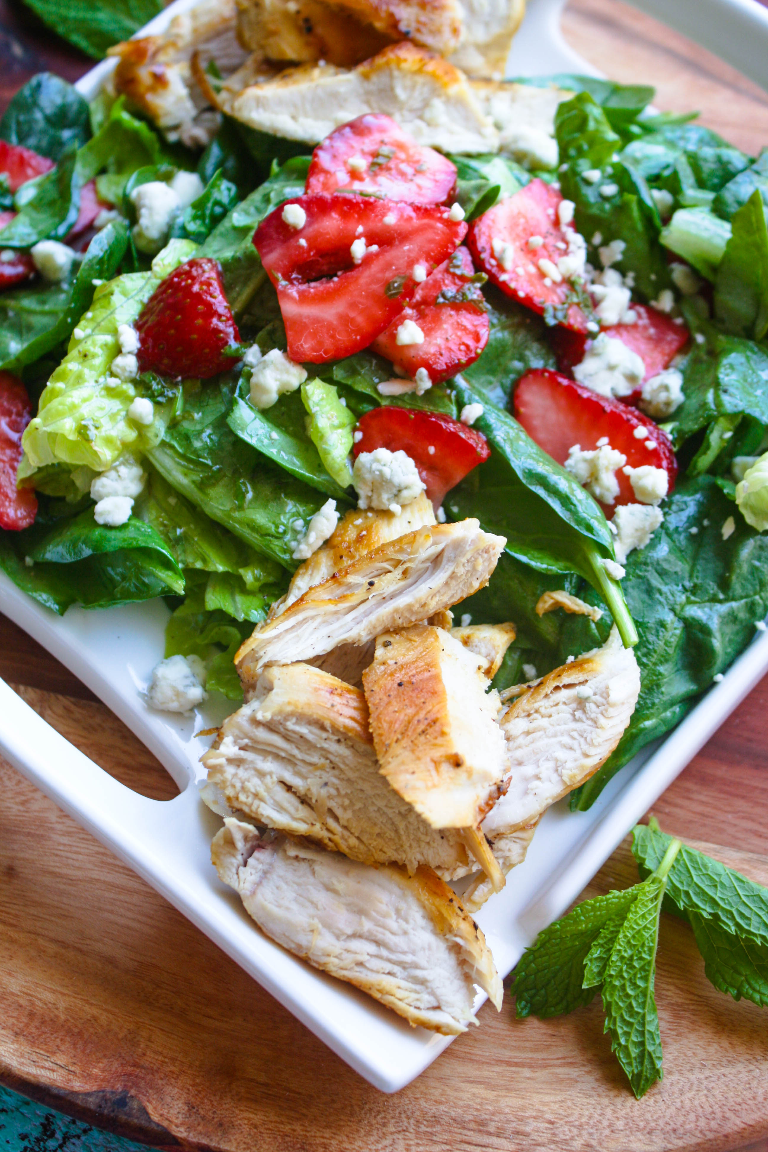 Chicken Salad with Strawberries and Honey-Lemon Mint Dressing is a sweet, satisfying meal. You'll love the flavors and colors in this easy-to-make, hearty salad.