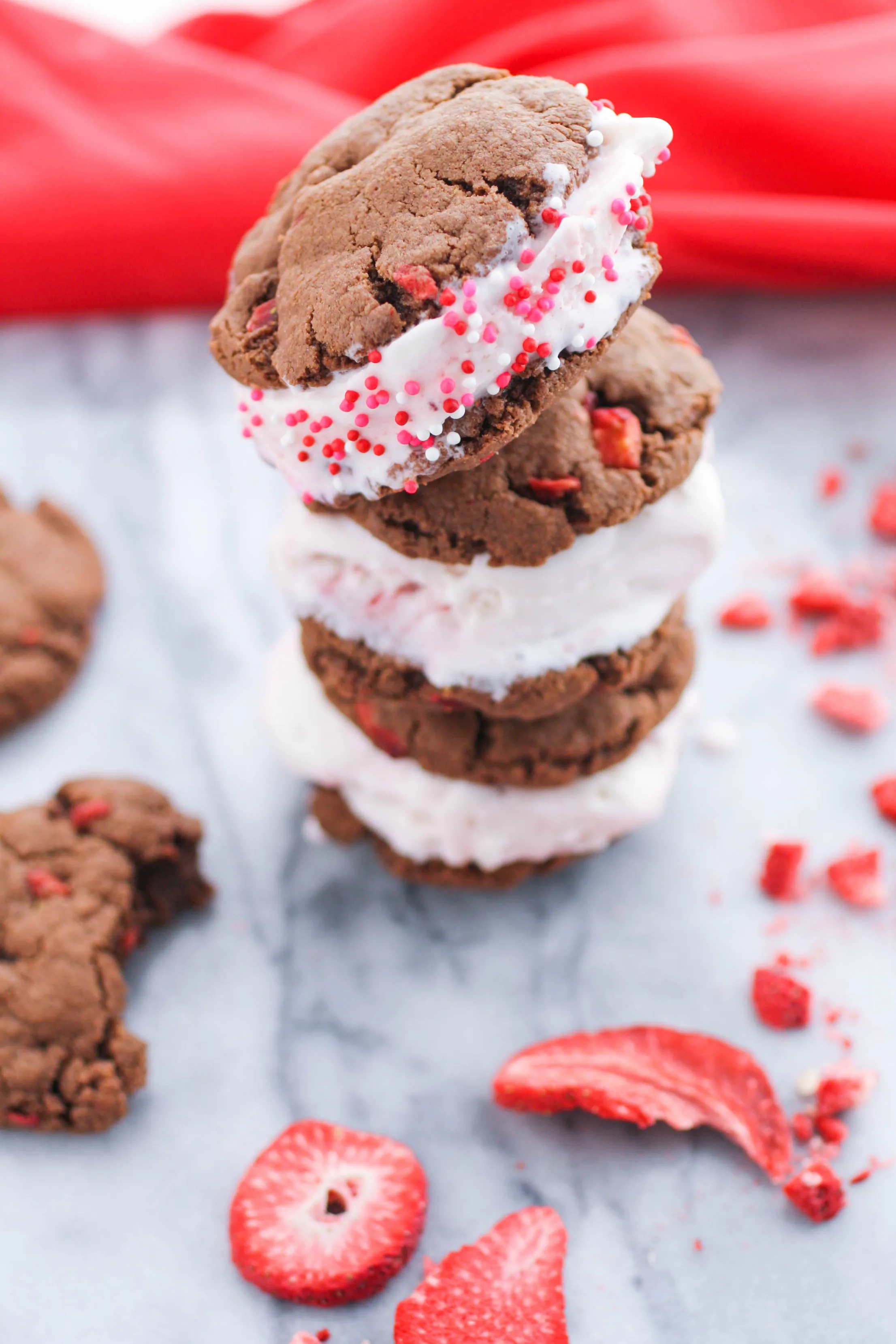 Strawberry-Nutella Cookie Ice Cream Sandwiches are such a fun treat! You'll love these Strawberry-Nutella cookies, and the ice cream sandwiches.