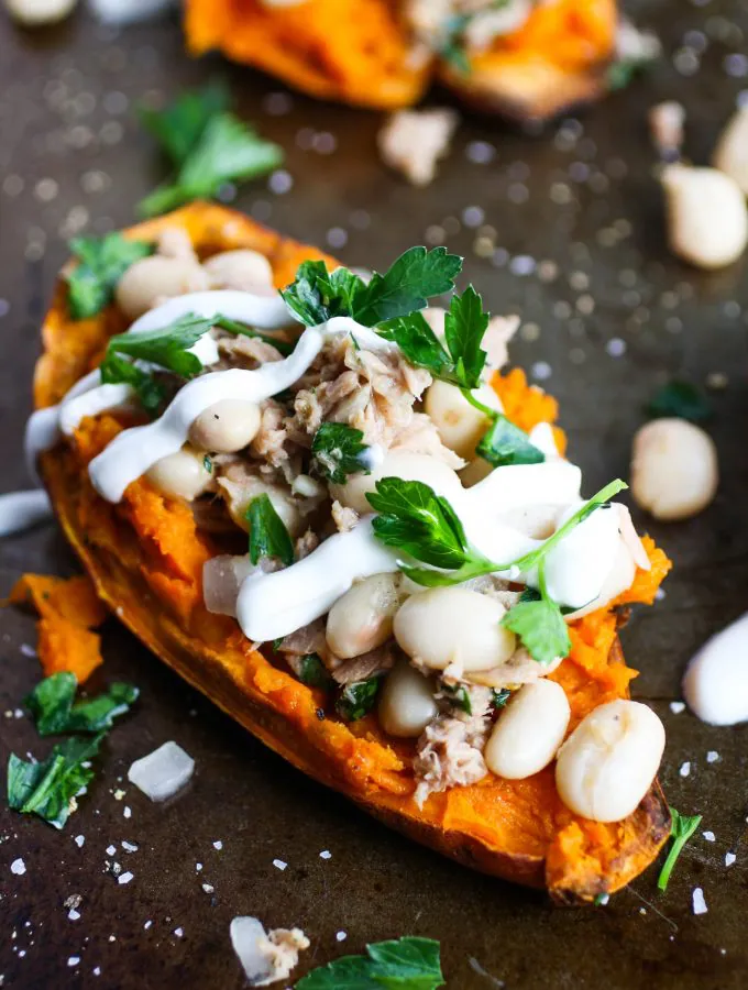 Stuffed Sweet Potatoes with Tuna and Beans is a fabulous meatless meal. These stuffed sweet potatoes are great for lunch or dinner.